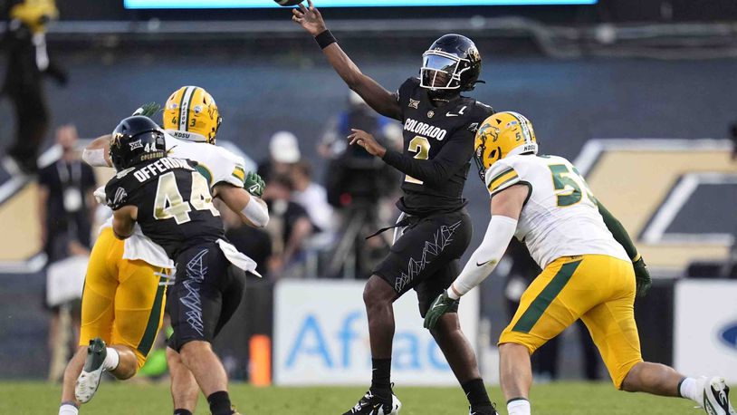 Colorado quarterback Shedeur Sanders passes during the first half of an NCAA college football game against North Dakota State, Thursday, Aug. 29, 2024, in Boulder, Colo. (AP Photo/Jack Dempsey)