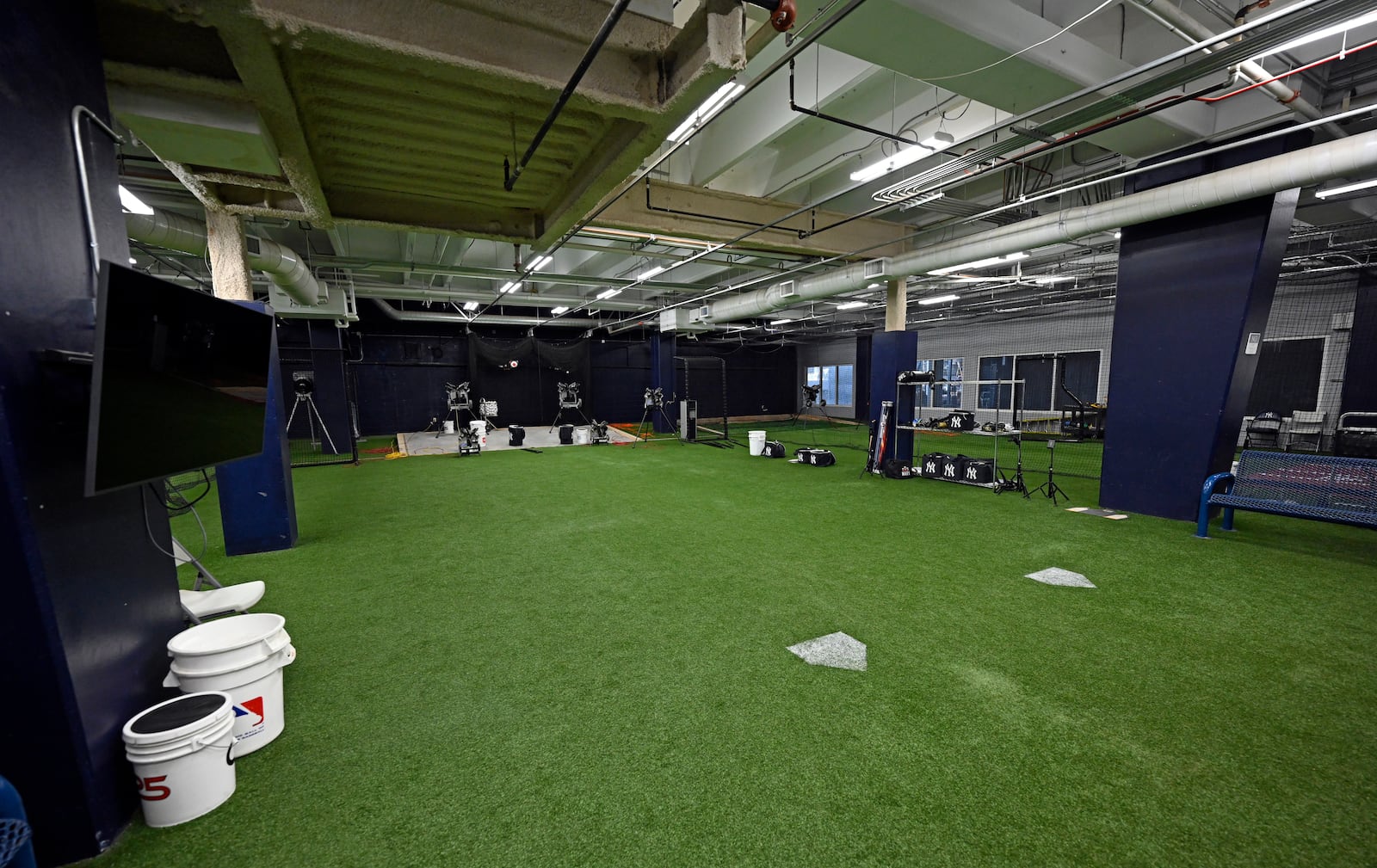 Batting cages stand ready adjacent to the New York Yankees clubhouse during a tour of the upgraded team spring training facilities Thursday, Feb. 13, 2025, at George M. Steinbrenner Field in Tampa, Fla. (AP Photo/Steve Nesius)