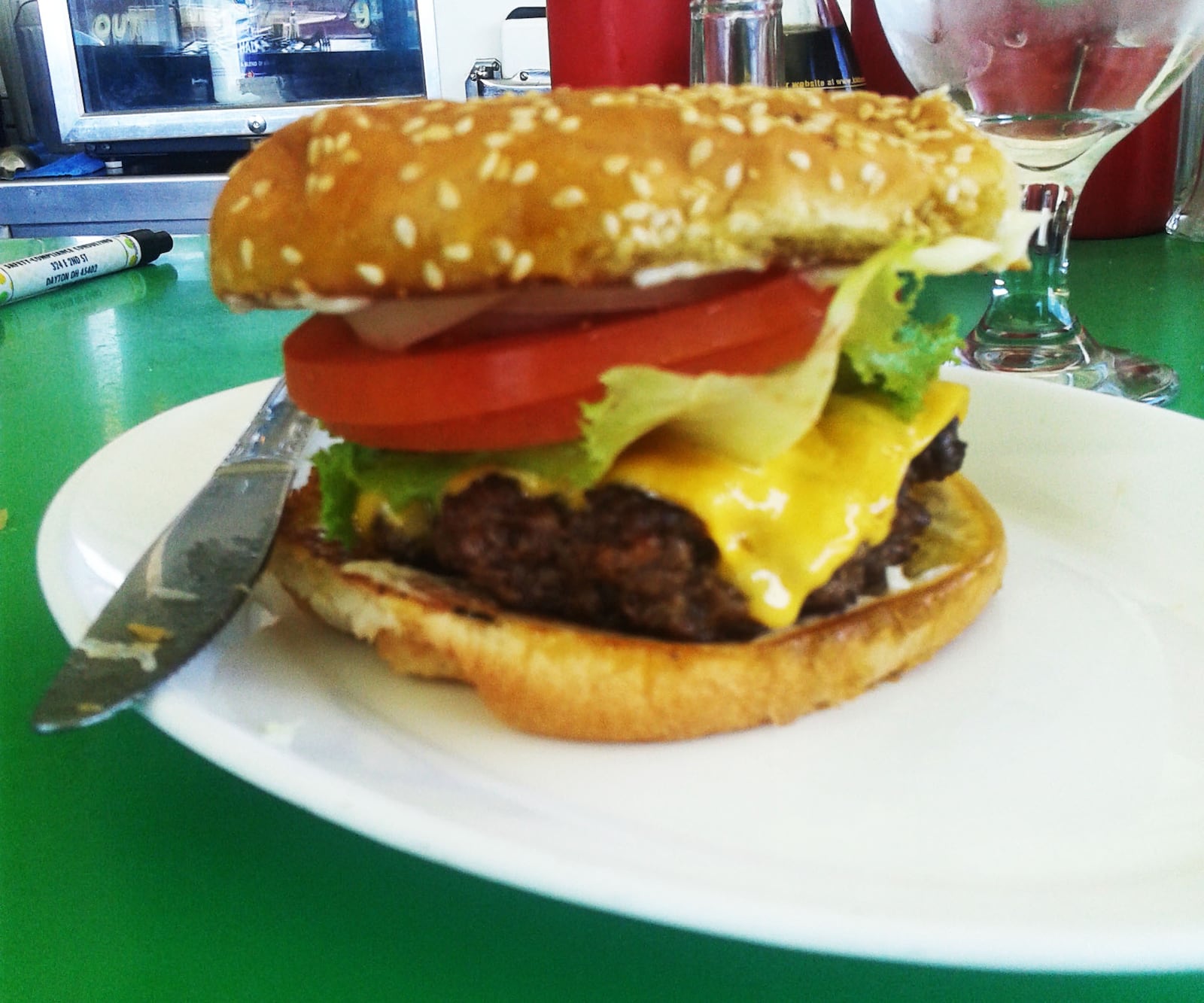 White Lotus ( 327 E. 3rd St., downtown Dayton) The Yummy Burger: To start, White Lotus is an incredible spot. While I don’t know the specific history of this awesome food shack, you just have to walk in the front door to know that it’s storied. Behind a food counter out of the '70s and a row of bar stools stands a lovely yet intense proprietor. I have never seen her not wearing her signature large sunglasses inside while she cooks each dish to order. Hosting a menu that is a mix of Thai and American cuisine, I rarely get beyond the Yummy Burger, which used to be the name of the restaurant. This burger is a pretty standard preparation, sesame seed bun, half-pound ground beef patty, lettuce, tomato, mayo and American cheese. I’ll even note that I once asked to get my burger mid rare, but when I asked the lady, she was very stern and unwavering in her response: “no.” So, I had it her way and honestly I cannot tell you what she did to make this “The Burger.” I think she may slow cook it in melted butter. I have trained as a professional burgernaught, tasting many a cheeseburger and somehow this one has stuck with me. Trust the lady, she knows what she’s doing. Also, their Thai food ain’t bad either.