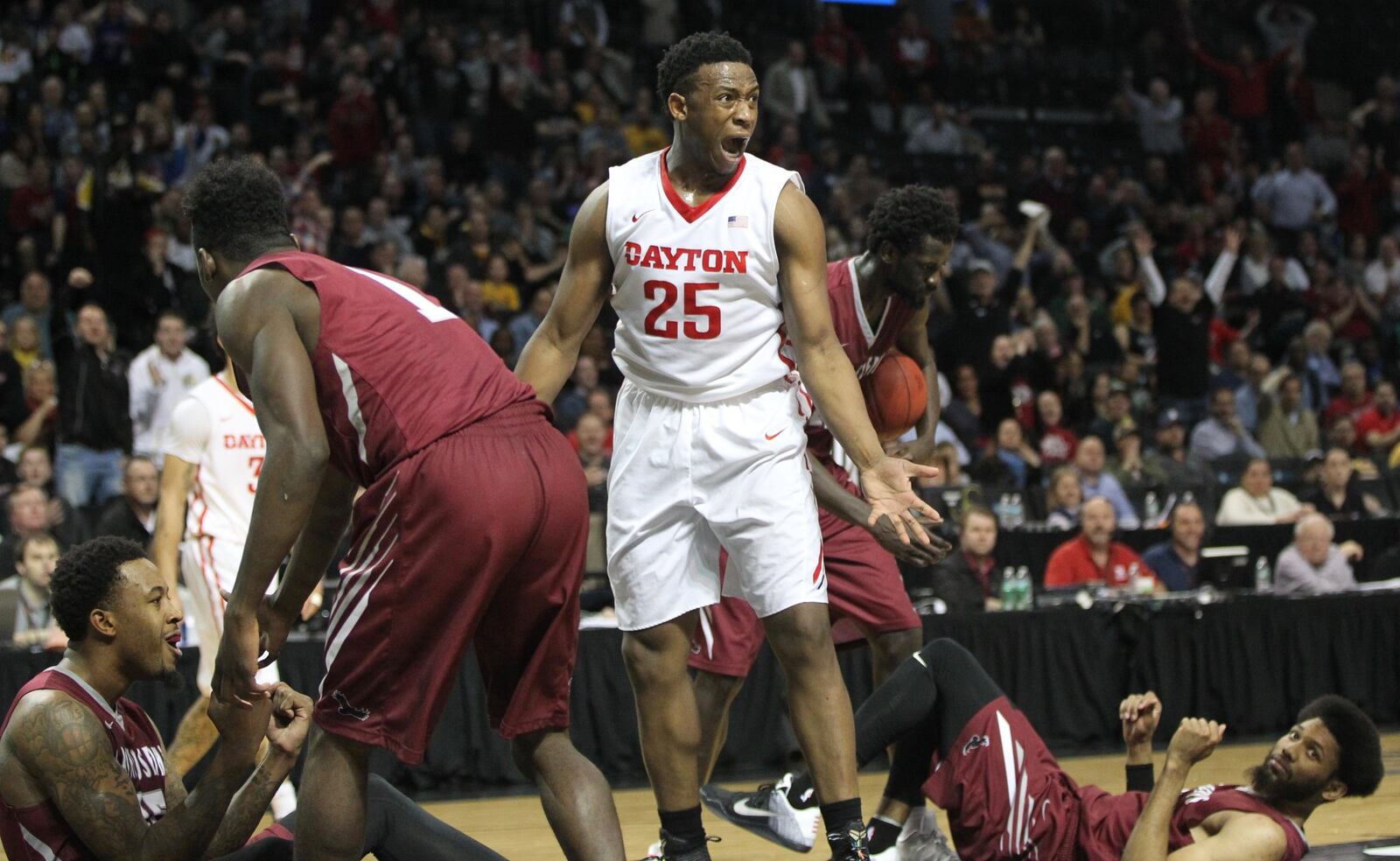 Dayton’s Kendall Pollard reacts after being called for a charge in the final minutes against St. Joseph’s in the semifinals of the Atlantic 10 tournament on Saturday, March 12, 2016, at the Barclays Center in Brooklyn, N.Y. David Jablonski/Staff