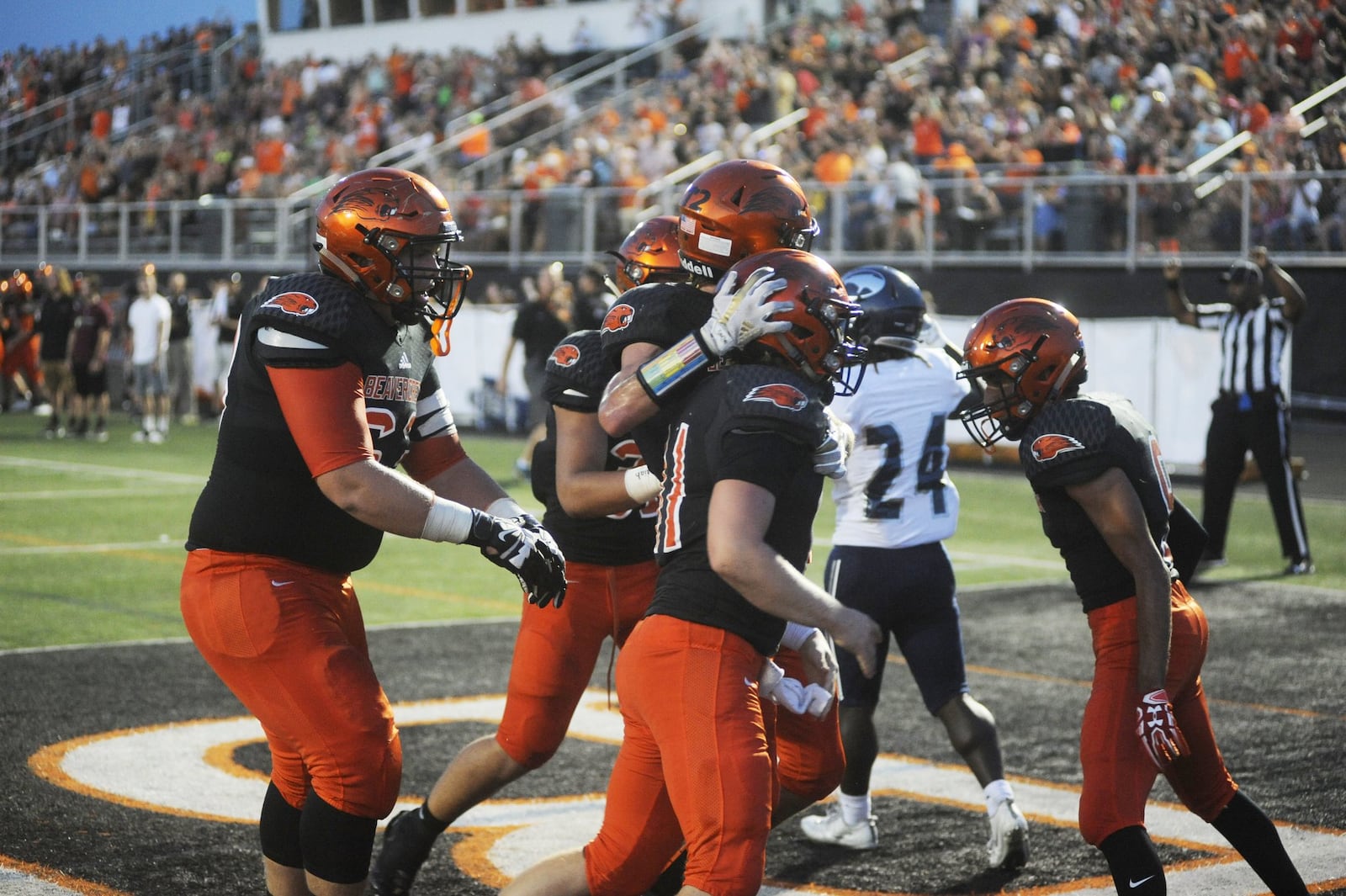 Beavercreek’s Cody Hocker (front) scored on a 9-yard run. Beavercreek defeated visiting Fairmont 14-3 in a GWOC National East high school football opener on Friday, Sept. 22, 2017. MARC PENDLETON / STAFF