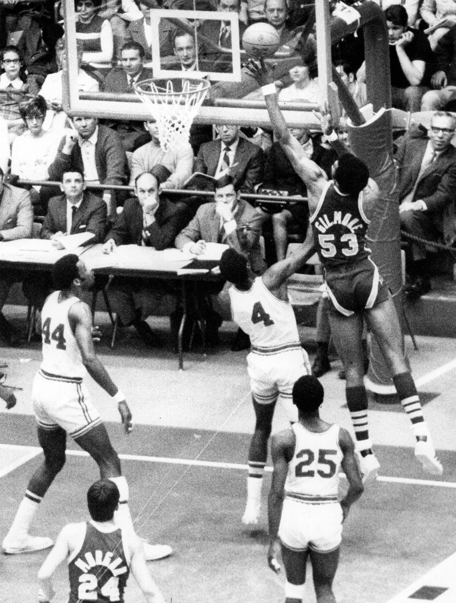 Artis Gilmore, right, grabs one of his 19 rebounds against Western Kentucky during a 1970 NCAA tournament game at the UD Arena. Defending Gilmore is Western Kentucky's Clarence Glover, 4. Dayton Daily News Archive.