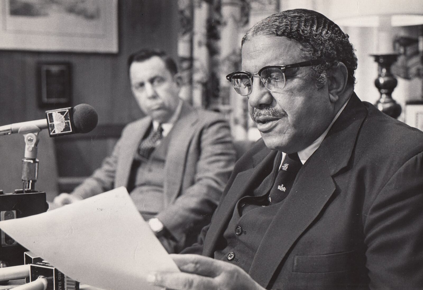 Mayor James H. McGee reads a letter on behalf of the City of Dayton in 1980. At rear is is Dr. David Ponitz. DAYTON DAILY NEWS ARCHIVE