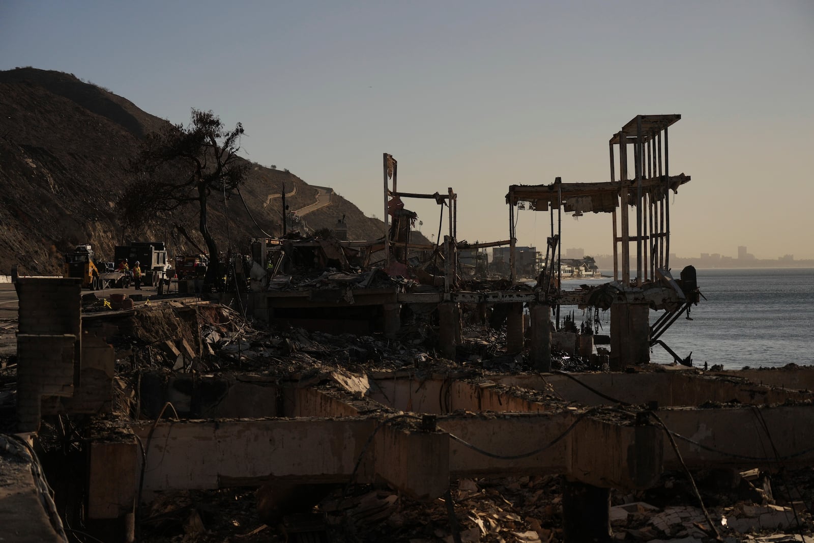 Beach front homes destroyed by the Palisades Fire are seen in Malibu, Calif., Wednesday, Jan. 15, 2025. (AP Photo/Jae C. Hong)