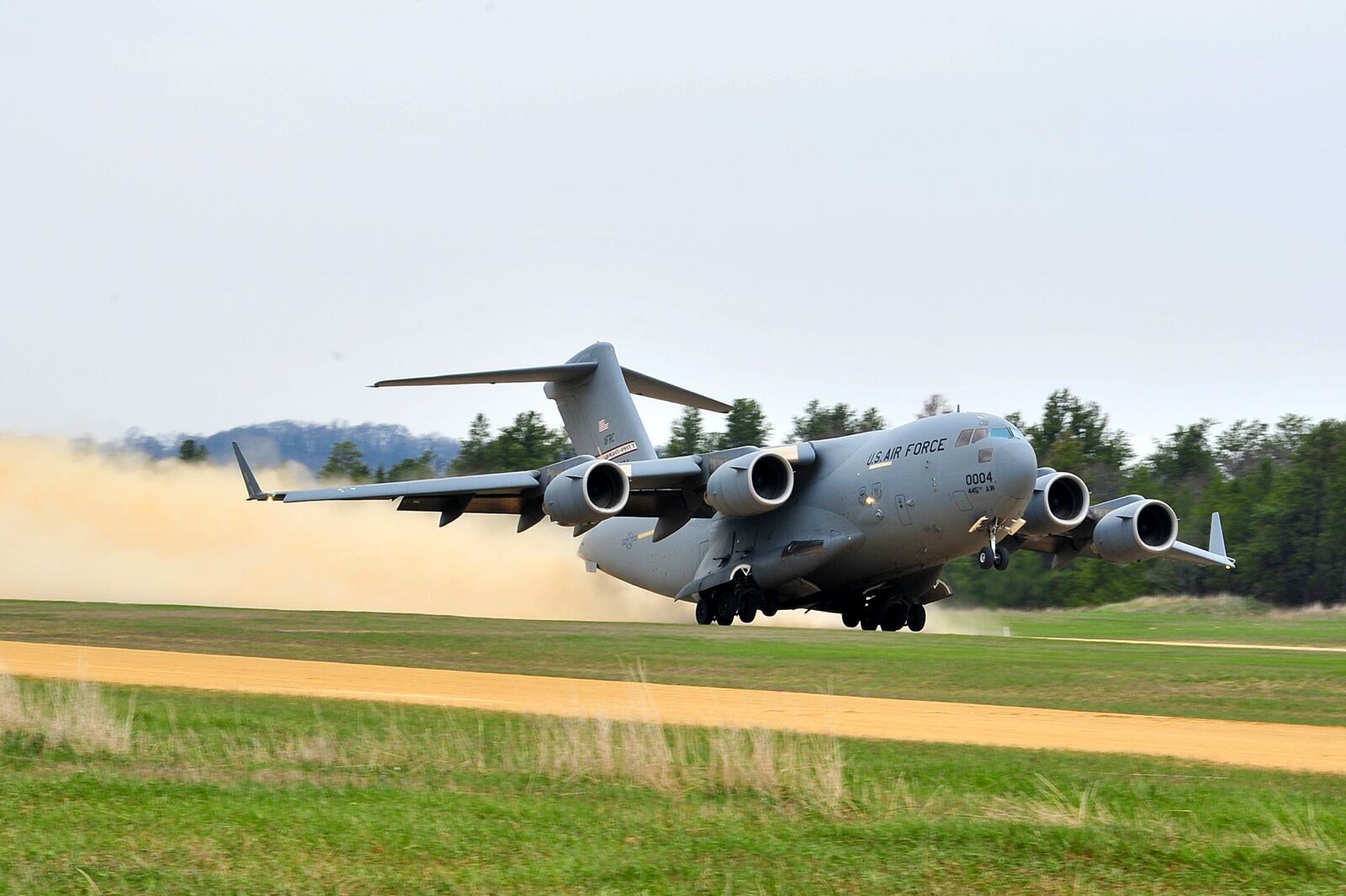 A C-17 Globe Master, 89th Airlift Wing Wright Patterson AFB, Ohio takes off from the Young Air Assault Strip on May 7, 2014 during exercise Patriot Warrior at Fort McCoy, Wis. (U.S. Air Force photo by Master Sgt. Francisco V. Govea II/ Released)