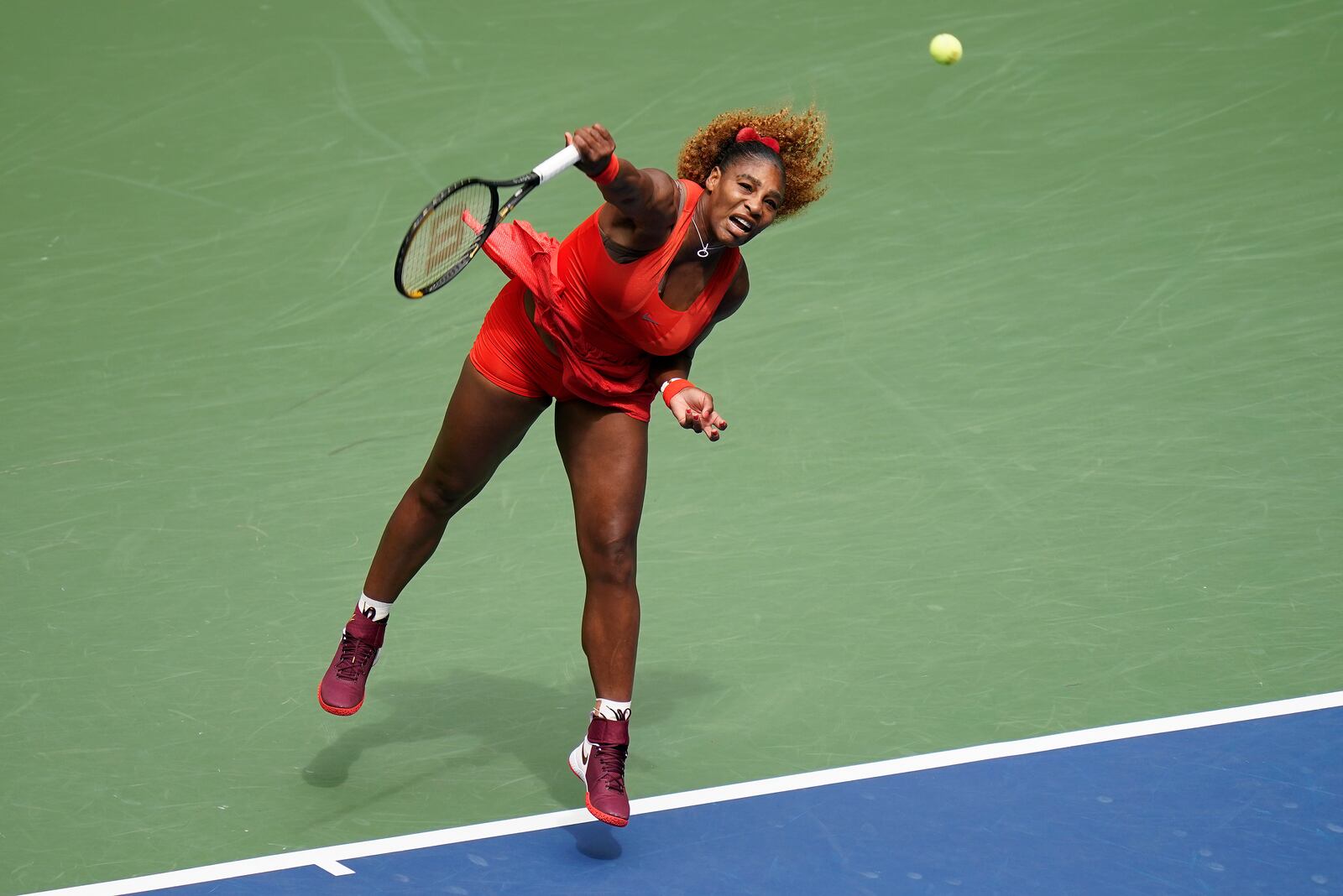 Serena Williams, of the United States, serves to Tsvetana Pironkova, of Bulgaria, during the quarterfinals of the US Open tennis championships, Wednesday, Sept. 9, 2020, in New York. (AP Photo/Seth Wenig)