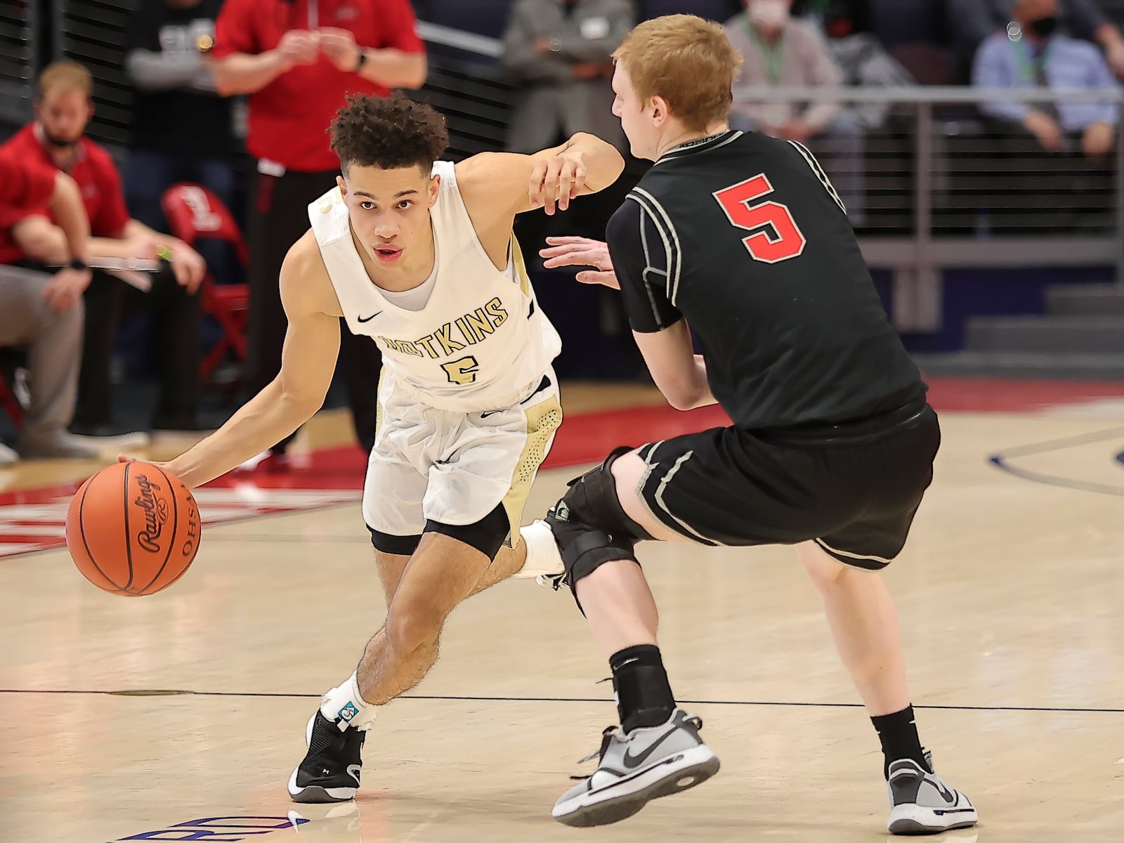 Jayden Priddy-Powell of Botkins drive past Columbus Grove's Gabe Clement in the Division IV state championship game at UD Arena on Sunday, March 21, 2021. it's the first boys basketball state title in school history. Michael Cooper/CONTRIBUTED