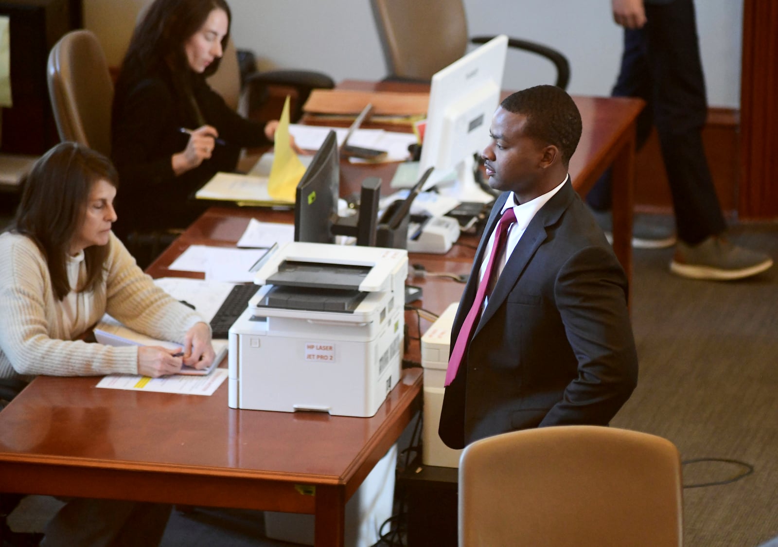 Sheldon Timothy Herrington Jr., who is on trial on a capital murder charge in the 2022 death of University of Mississippi student Jimmie "Jay" Lee, looks out into the courtroom during the lunch break, in Oxford, Miss. on Tuesday, Dec. 3, 2024. (Bruce Newman/The Northeast Daily Journal via AP, Pool)