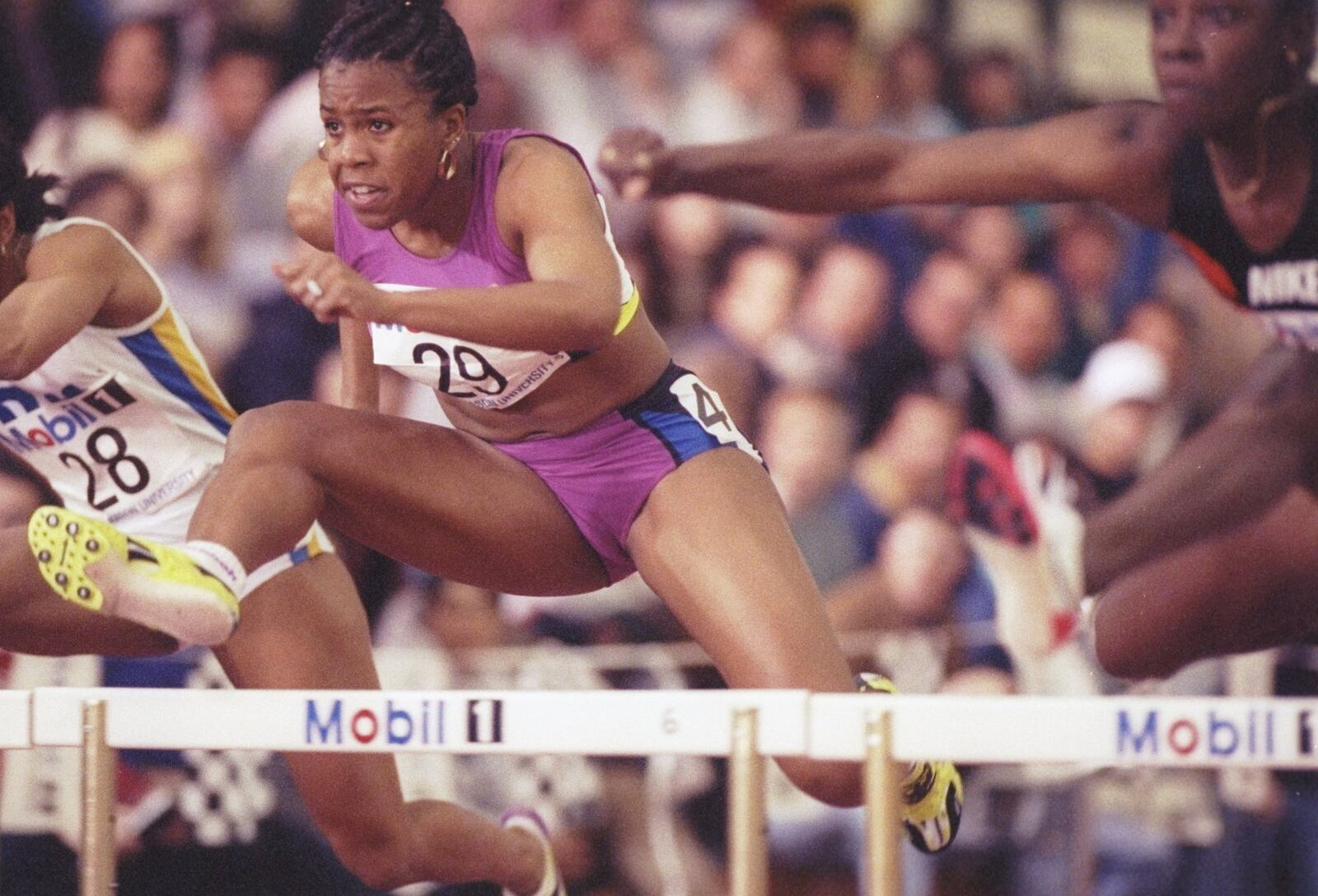 LaVonna Martin Floreal slides over the hurdles at the Mobil One Track and Field event in 1993. Tony Duffy /Allsport