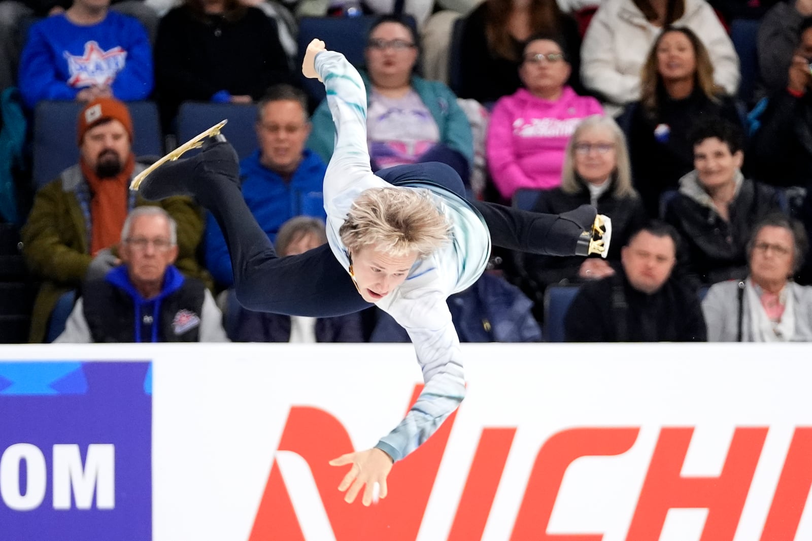 Ilia Malinin of the United States competes during the men's short program at the Skate America figure skating event in Allen, Texas, Saturday, Oct. 19, 2024. (AP Photo/Tony Gutierrez)