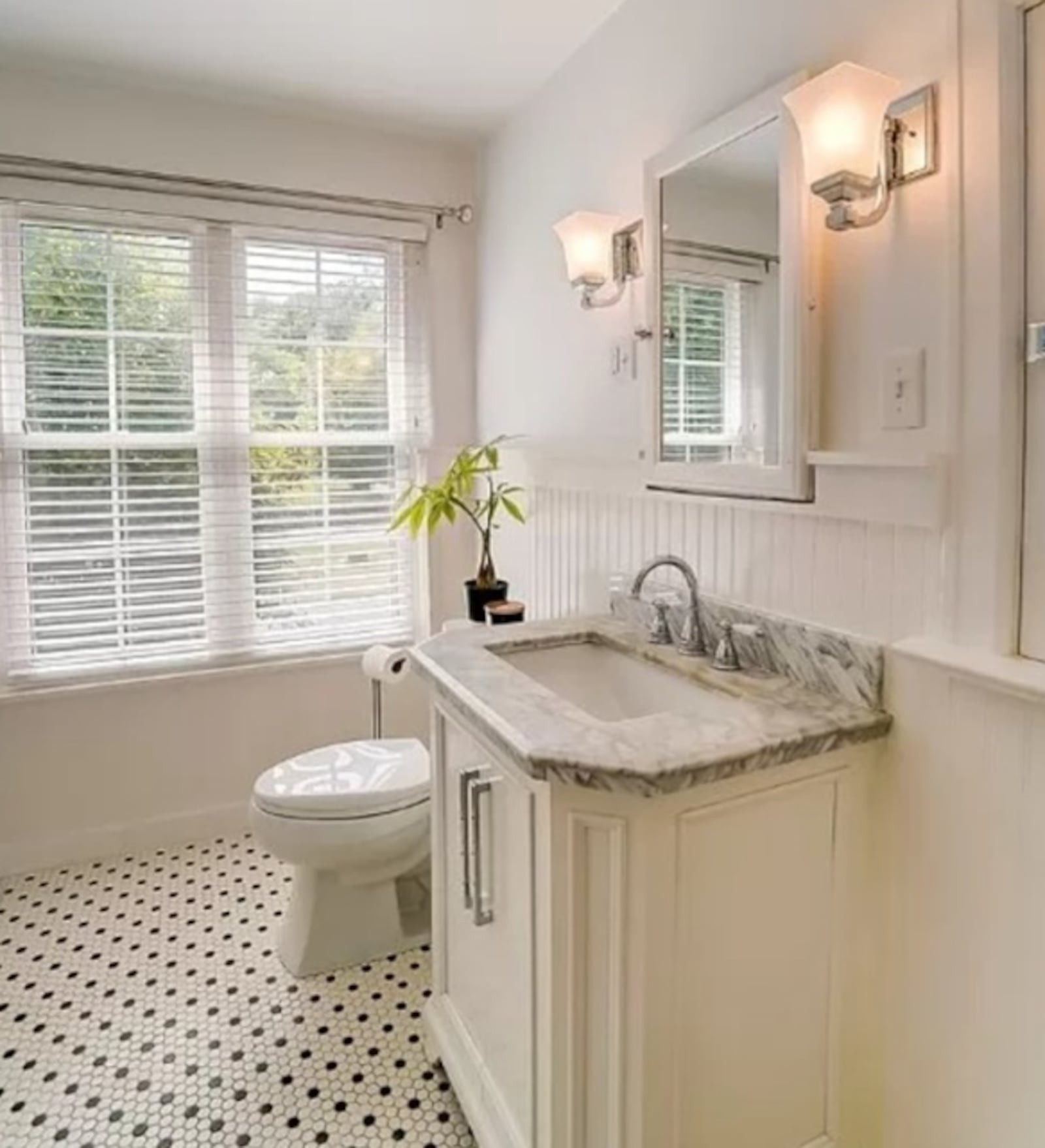 Unique finishes are part of this bathroom in a home for sale on Far Hills Avenue in Oakwood. CONTRIBUTED