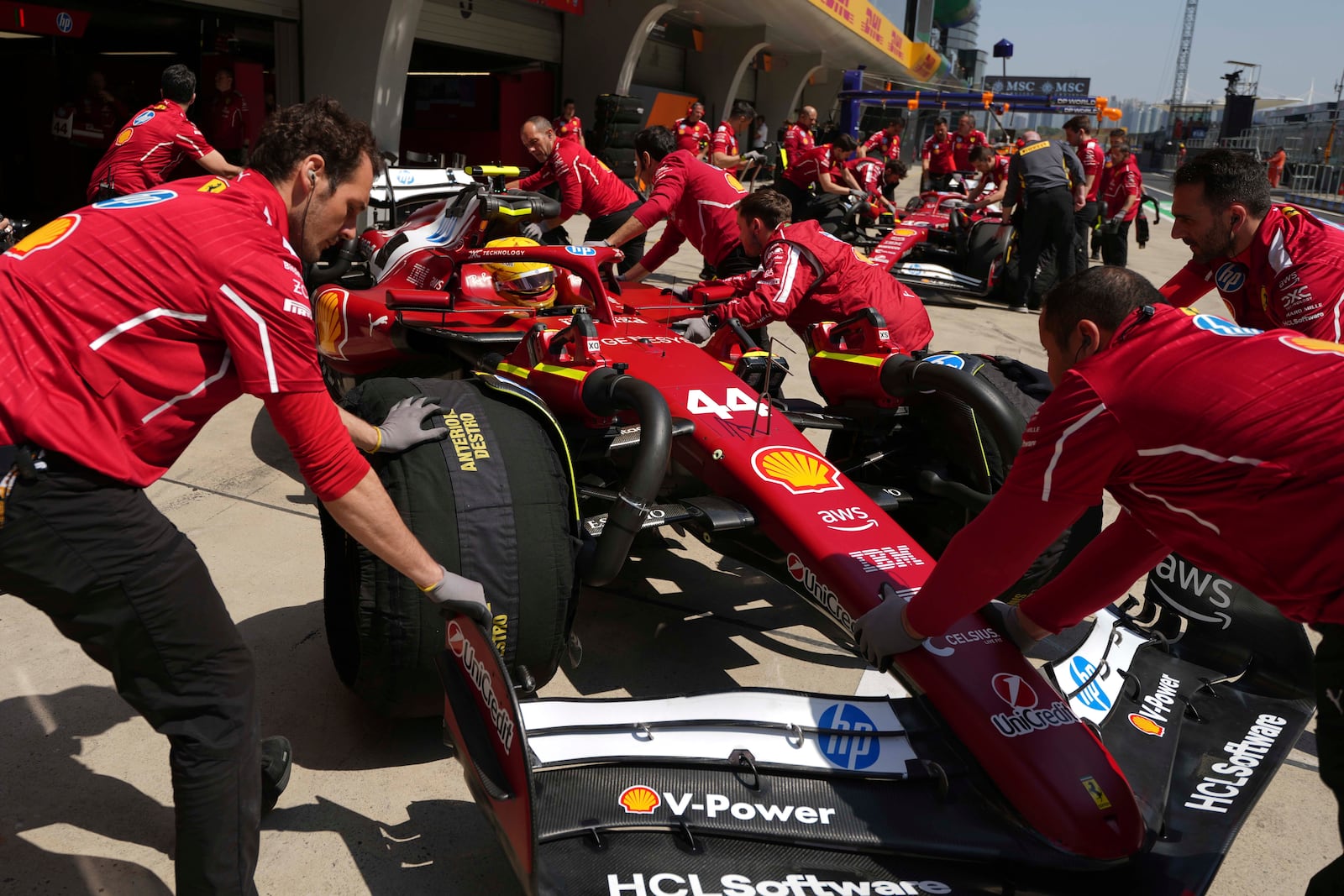 Ferrari driver Lewis Hamilton of Britain gets a pit stop during the first free practice at the Shanghai International Circuit in Shanghai, China, Friday, March 21, 2025, ahead of the Chinese Formula One Grand Prix (Sunday). (AP Photo/Andy Wong)