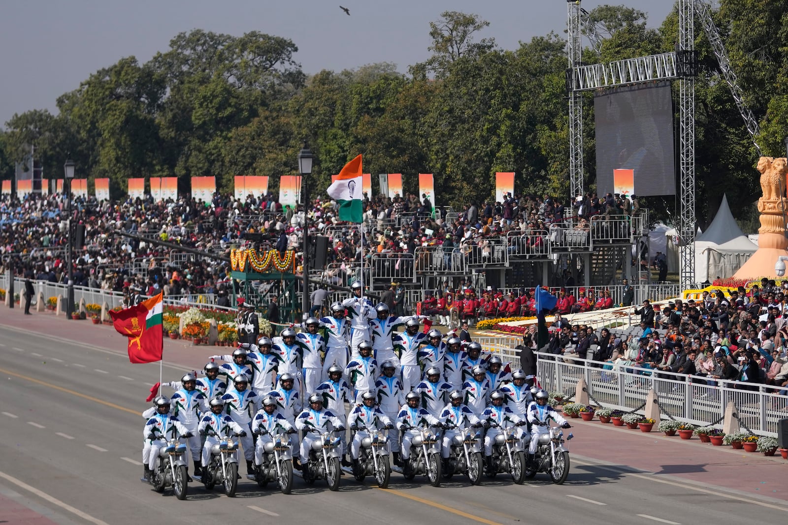 Indian Army's daredevils perform stunts through the ceremonial Kartavya Path during India's Republic Day parade celebrations in New Delhi, India, Sunday, Jan. 26, 2025. (AP Photo/Channi Anand)