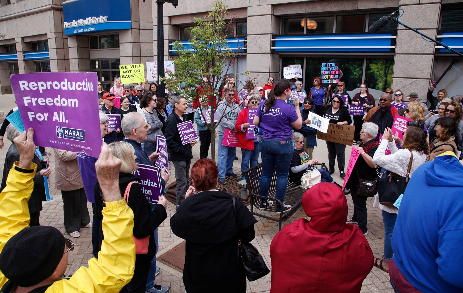 A Pro-choice rally drew about 100 people to the Premier Health building on North Main Street in Dayton on Tuesday. The group protested more restrictions placed on abortions and encouraged Premier Health to make a transfer agreement with Women's Med Center of Dayton, a move needed keep the center open according to Ohio law.  Two Pro-life signs were seen at the rally.  TY GREENLEES / STAFF