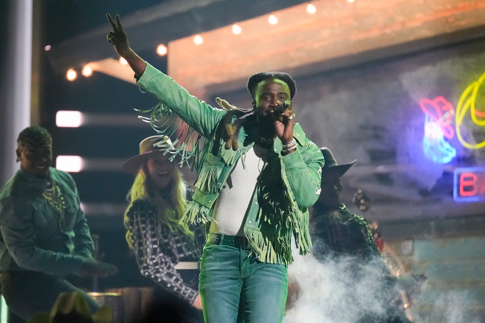 Shaboozey performs a medley during the 58th Annual CMA Awards on Wednesday, Nov. 20, 2024, at Bridgestone Arena in Nashville, Tenn. (AP Photo/George Walker IV)