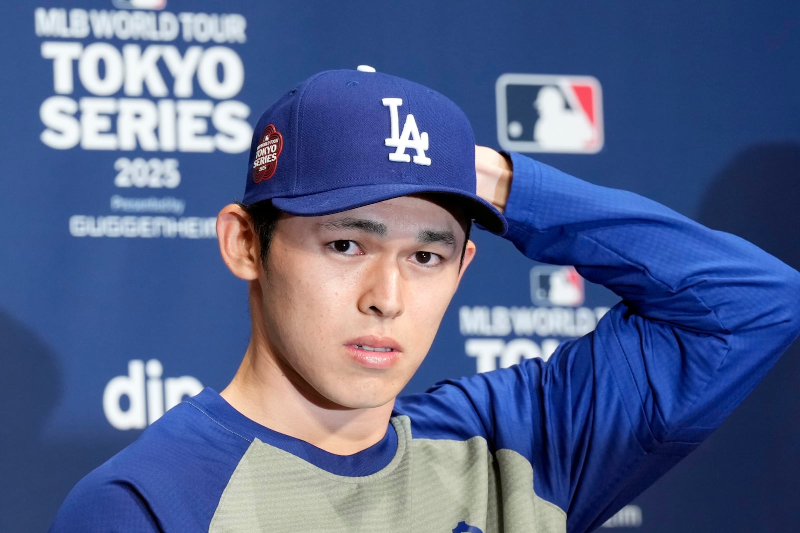 Los Angeles Dodgers pitcher Roki Sasaki attends the official Press conference Friday, March 14, 2025, in Tokyo, as the Dodgers play their MLB opening games against the Chicago Cubs at Tokyo Dome next week. (AP Photo/Eugene Hoshiko)