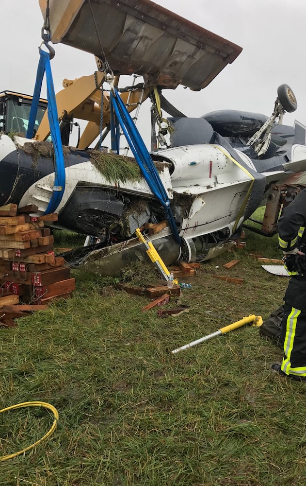 PHOTOS: Thunderbird flips on its top at Dayton Air Show