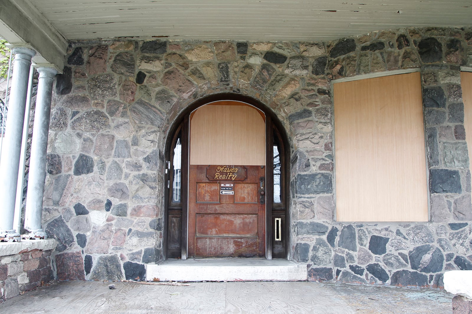 The first-floor exterior of the Cox Mansion, 815 W. Grand Ave., is made of granite boulders precisely fitted together. LISA POWELL / STAFF