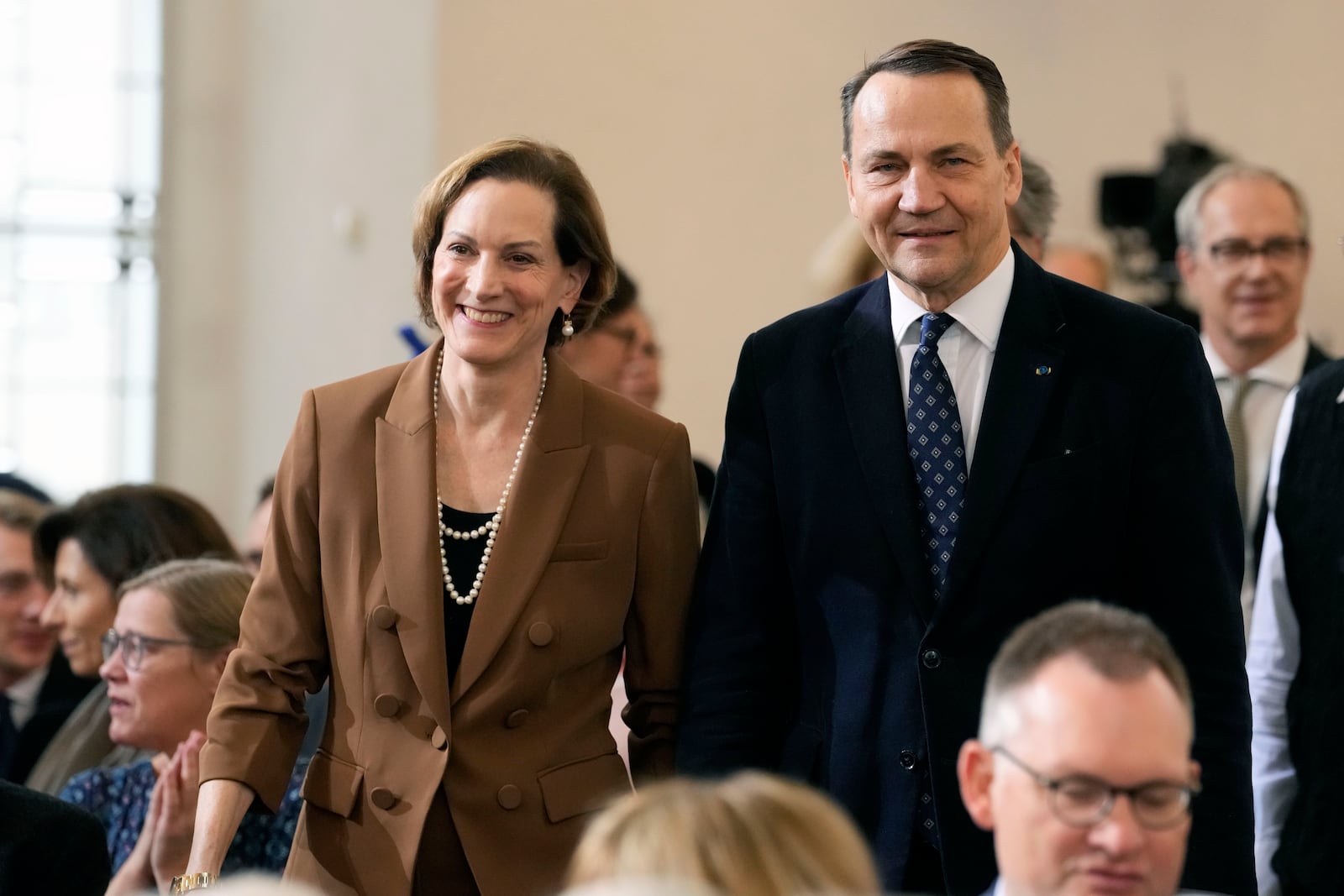 American journalist and historian Anne Applebaum arrives with her husband Poland's Foreign Minister Radosław Sikorski at the Peace Prize of the German Book Trade ceremony for Anne Applebaum at the St. Paul's Church in Frankfurt, Germany, Sunday, Oct. 20, 2024.(AP Photo/Martin Meissner, Pool)