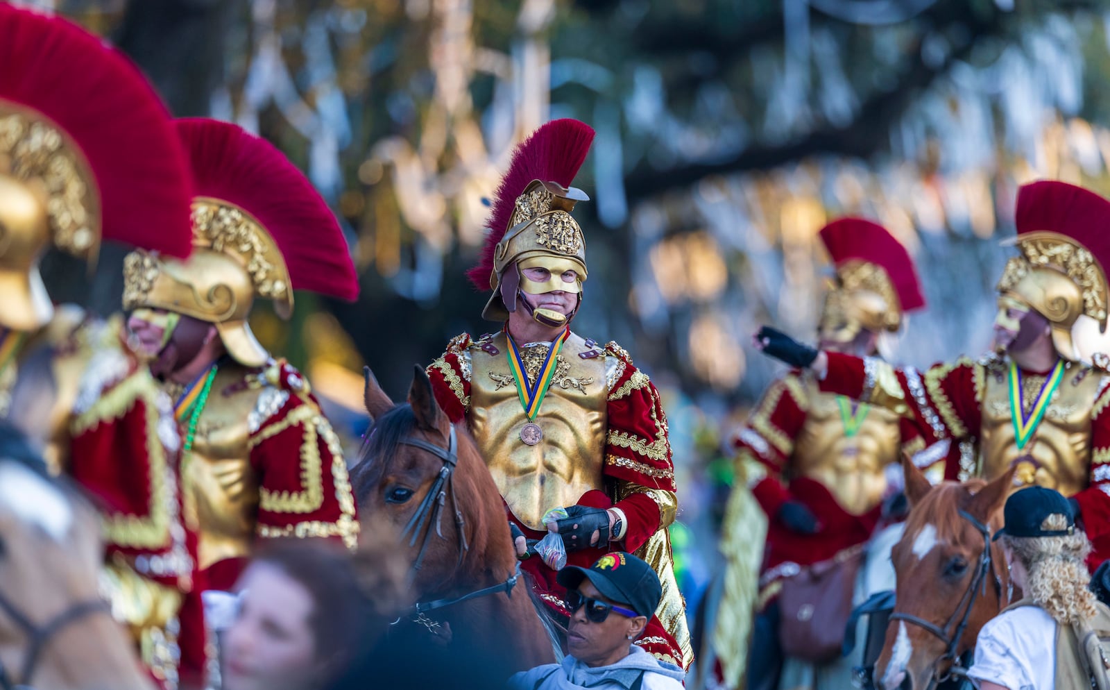 The Krewe of Bacchus rolls through the streets of New Orleans, Sunday, March 2, 2025. (Chris Granger/The Times-Picayune/The New Orleans Advocate via AP)