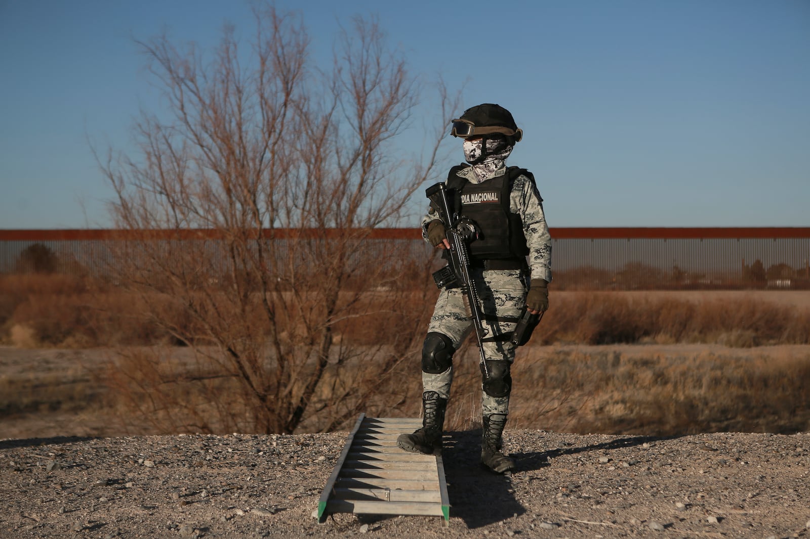 A Mexican National Guard member patrols along the Mexico-US border in Ciudad Juarez, Wednesday, Feb. 5, 2025. (AP Photo/Christian Chavez)