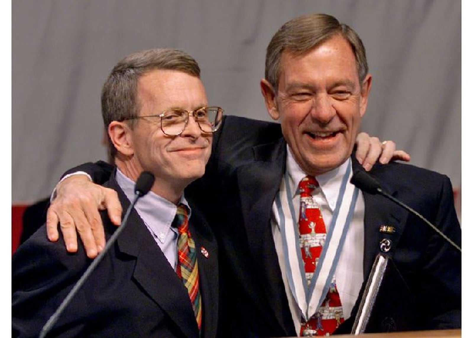 George Voinovich celebrates his victory in the 1998 U.S. Senate race with fellow Republican Senator Mike DeWine. THE COLUMBUS DISPATCH FILE PHOTO