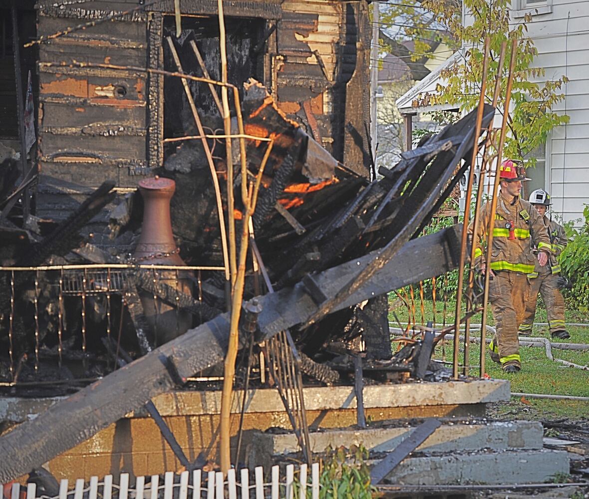 PHOTOS: Fire destroys Dayton home