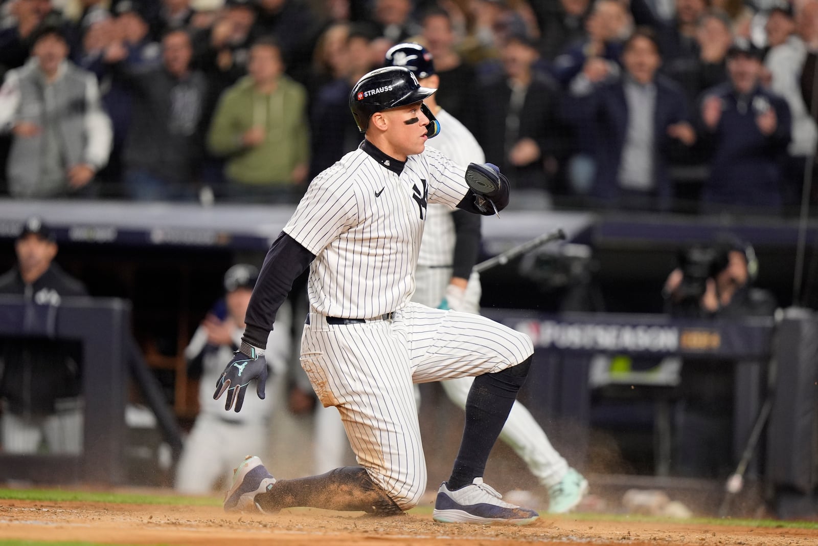 New York Yankees' Aaron Judge scores on a wild pitch by Cleveland Guardians pitcher Joey Cantillo during the third inning in Game 1 of the baseball AL Championship Series Monday, Oct. 14, 2024, in New York. (AP Photo/Frank Franklin II)