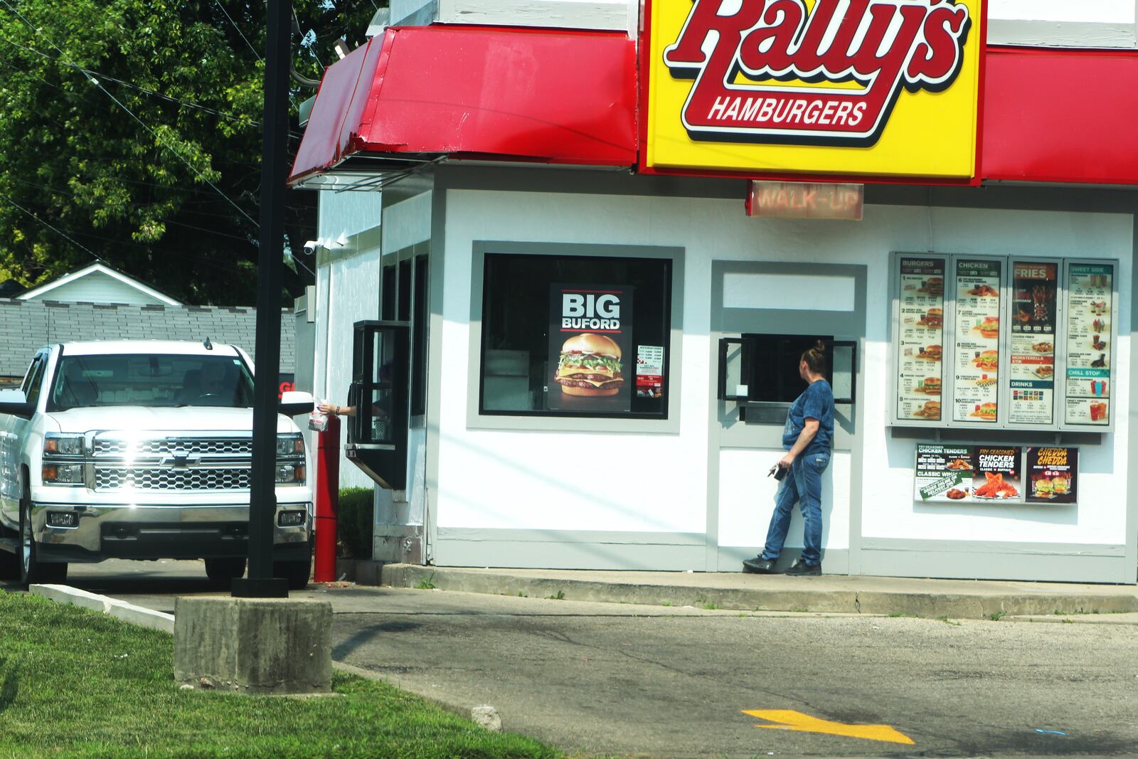 Customers at a Rally's Hamburgers in East Dayton. Fast food and counter positions are the most common occupation in the Dayton region. CORNELIUS FROLIK / STAFF