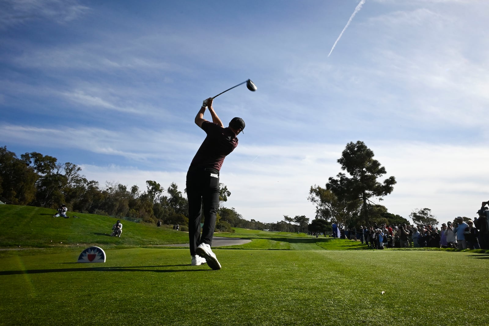 Ludvig Aberg hits from the ninth tee of the North Course at Torrey Pines during the first round of the Farmers Insurance Open golf tournament Wednesday, Jan. 22, 2025, in San Diego. (AP Photo/Denis Poroy)