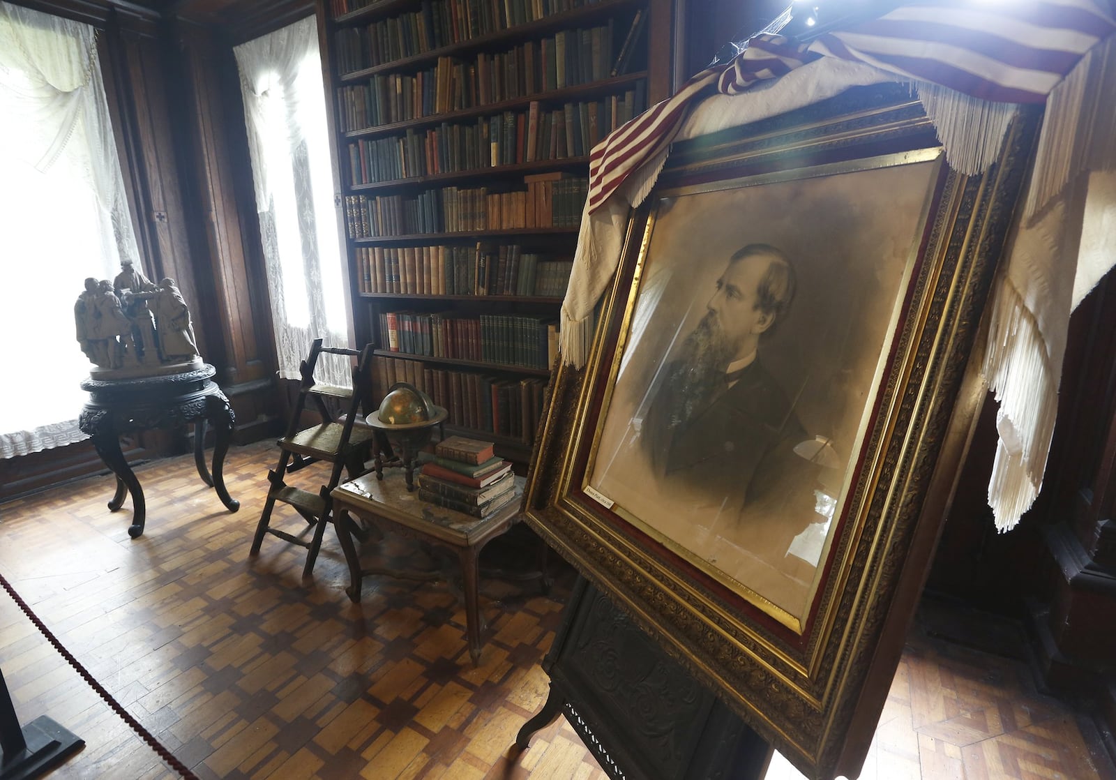 A framed portrait of Donn Piatt sits in the library of Mac-O-Chee the home he built in West Liberty. Donn Piatt and his brother Abram built a pair of homes in Logan County called the Piatt Castles. LISA POWELL / STAFF