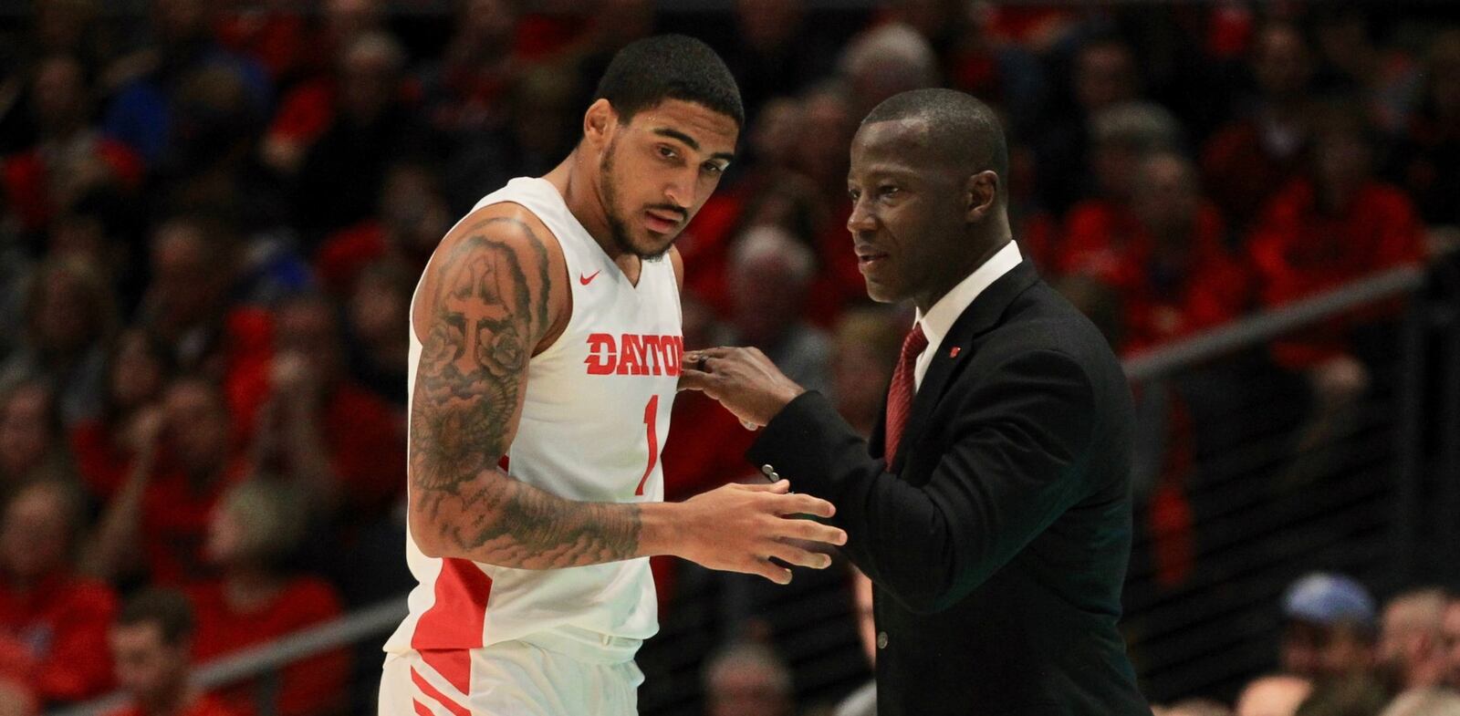 Dayton’s Obi Toppin talks to Anthony Grant during a game against Drake on Saturday, Dec. 14, 2019, at UD Arena. David Jablonski/Staff