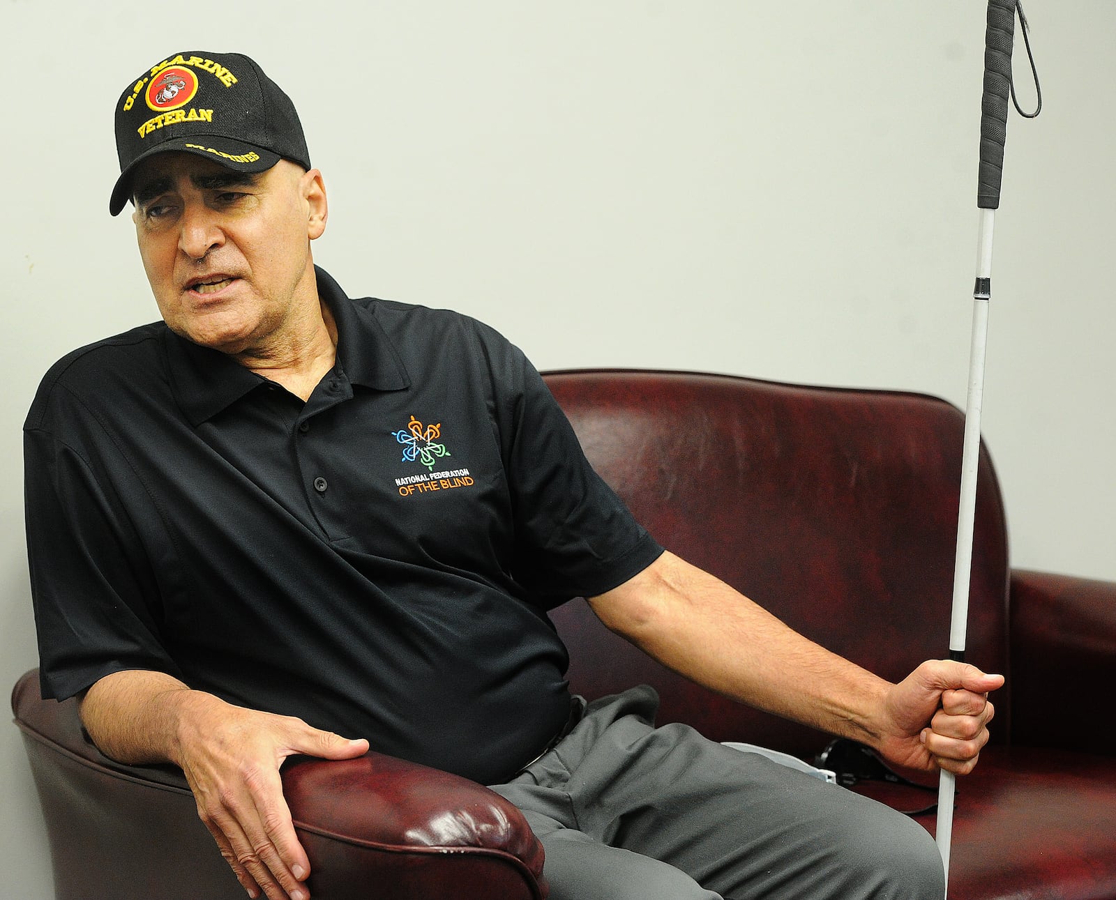 Jose Centeno, a 67-year-old Marine Corps veteran who is blind, will be running the Ohio River Road Runners half marathon in Xenia on Sunday, in tandem with Dayton VA optometrist Tim Morand. MARSHALL GORBY\STAFF 