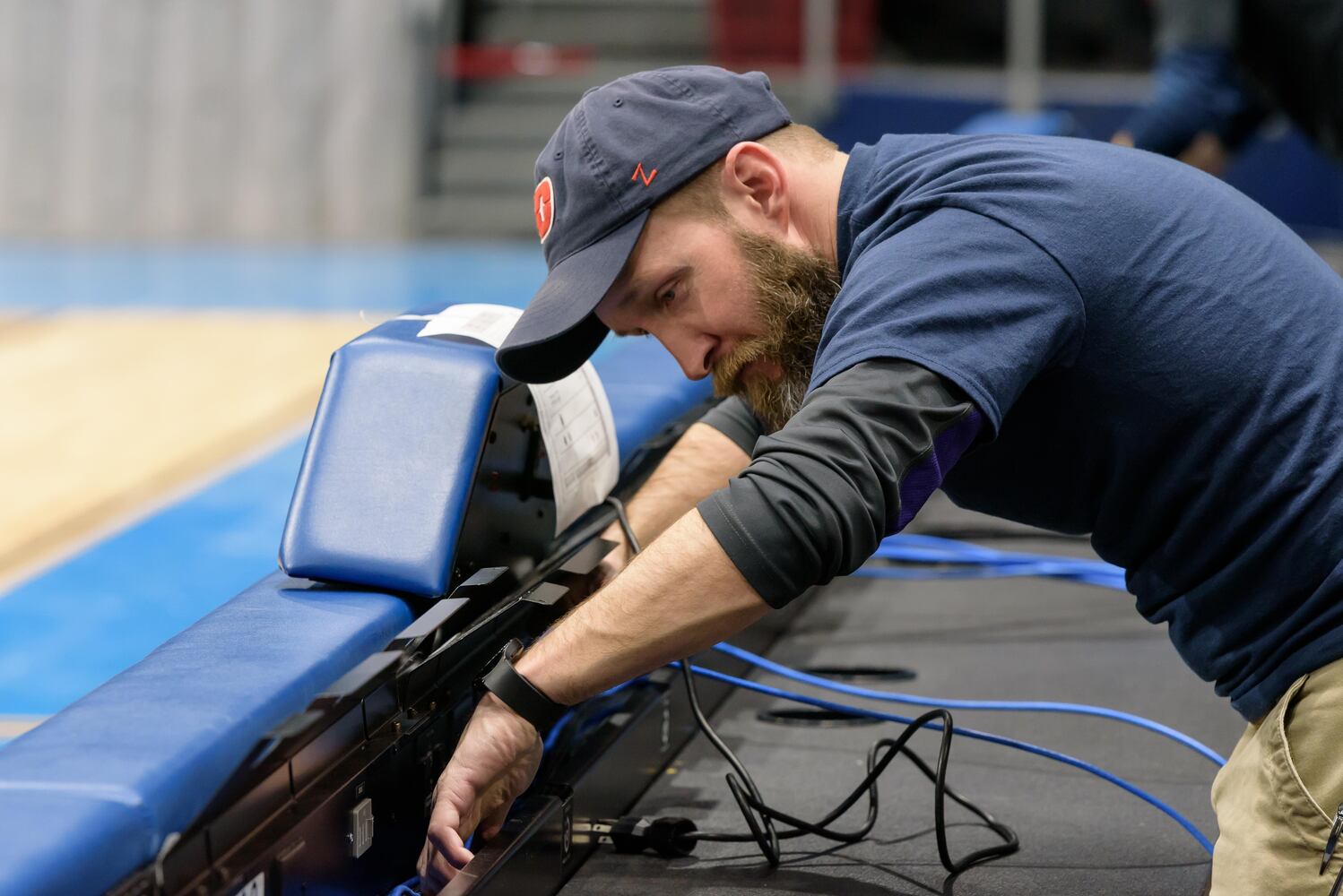 PHOTOS: NCAA First Four basketball court installation at UD Arena