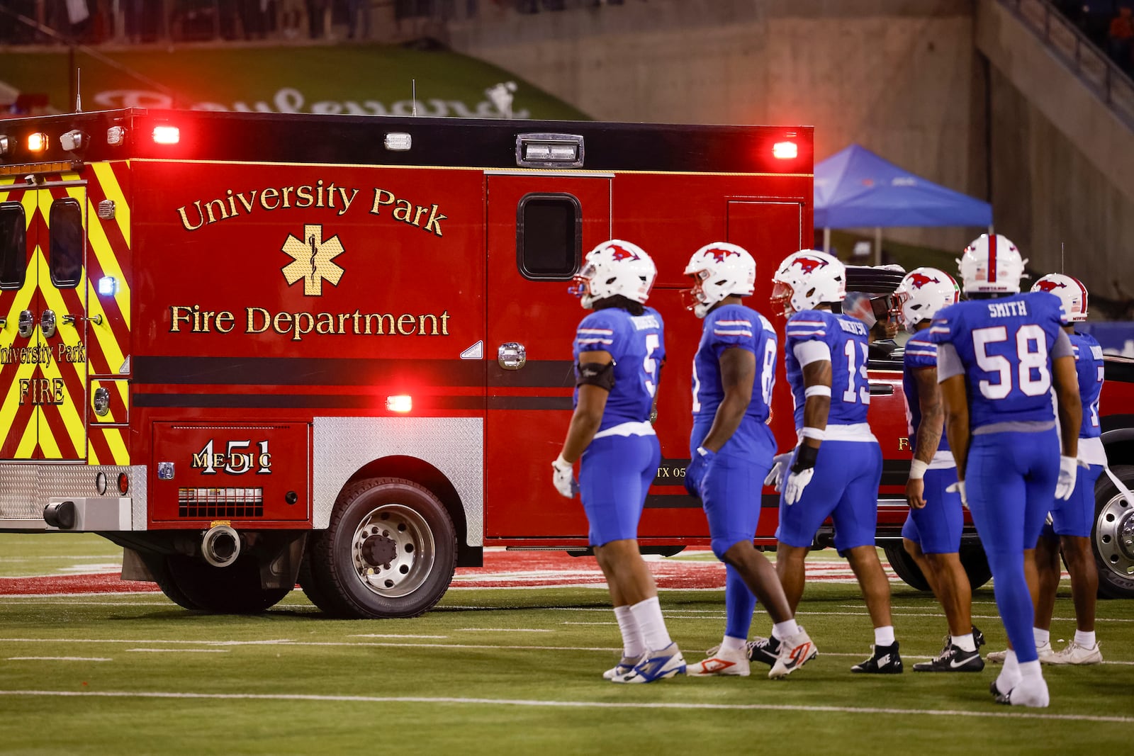 SMU cornerback AJ Davis is taken off the field by ambulance after sustaining an injury during the first half of an NCAA college football game against Pittsburgh in Dallas, Saturday, Nov. 2, 2024. (AP Photo/Gareth Patterson)