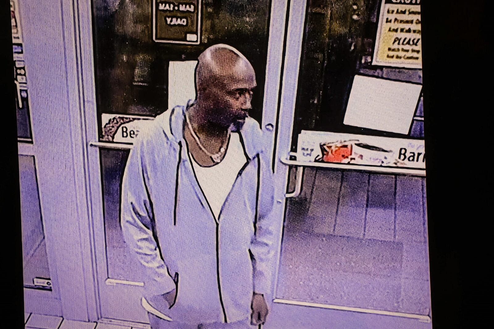 Dayton police released this image taken from surveillance video of a man suspected of severely beating and kidnapping a woman at UDF on East Siebenthaler in Dayton. JIM NOELKER/STAFF