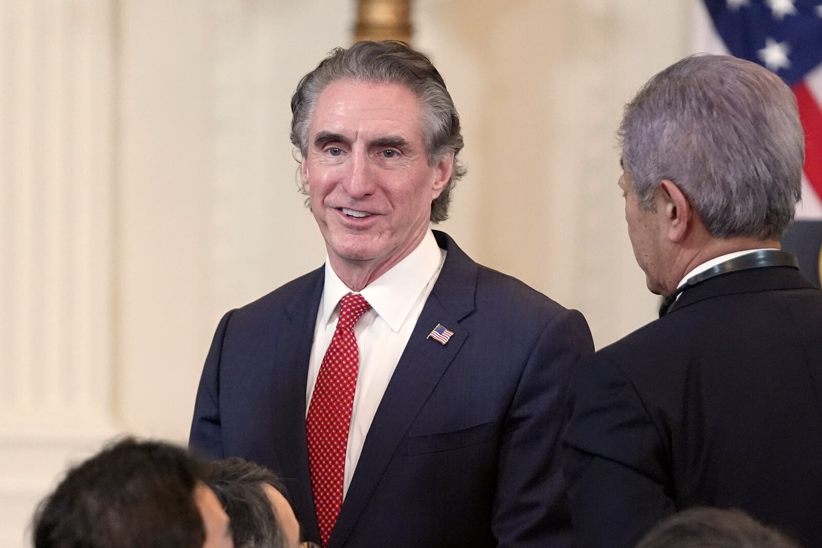 Interior Secretary Doug Burgum attends a news conference with Japanese Prime Minister Shigeru Ishiba at the White House, Friday, Feb. 7, 2025, in Washington. (AP Photo/Evan Vucci)