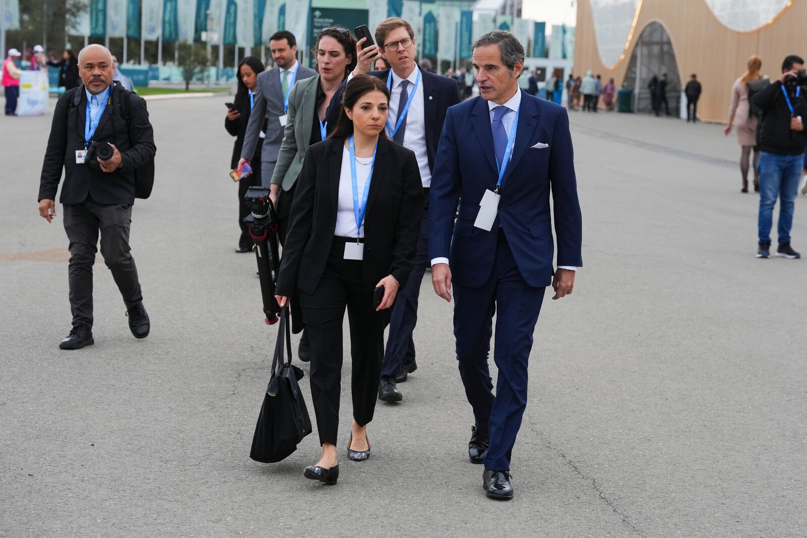 International Atomic Energy Agency Director General Rafael Mariano Grossi walks outside the venue for the COP29 U.N. Climate Summit, Tuesday, Nov. 12, 2024, in Baku, Azerbaijan. (AP Photo/Peter Dejong)