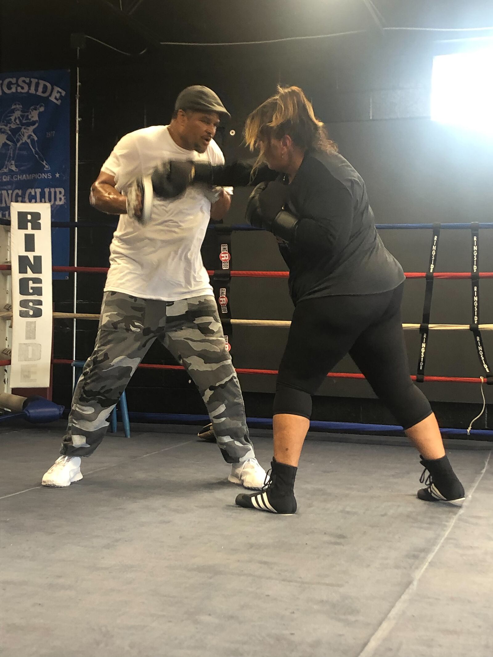 Katy Kuns has lost 120 pounds and is continuing her journey to a healthier life. She joined MPower Gym in Vandalia and has started learning to box. She is shown with her boxing coach, Craig Thurmond. CONTRIBUTION