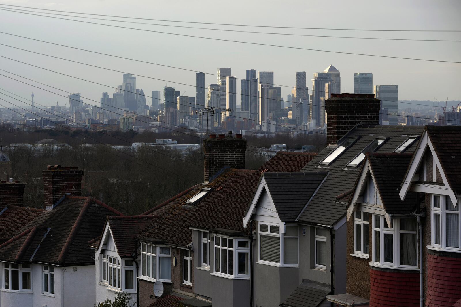 A general view of the skyline of commercial buildings, in London, Wednesday, March 19, 2025. (AP Photo/Kin Cheung)