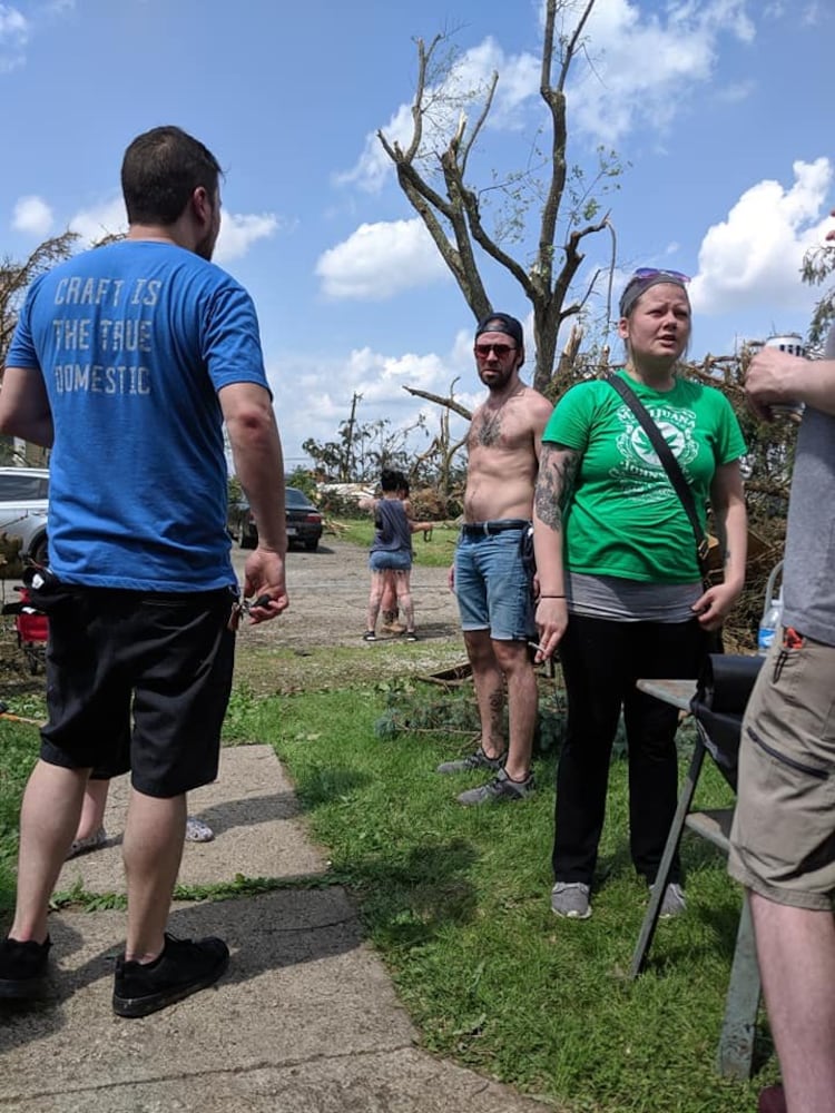 Photos: Community rallies around Dayton restaurant owner after son’s death, tornado