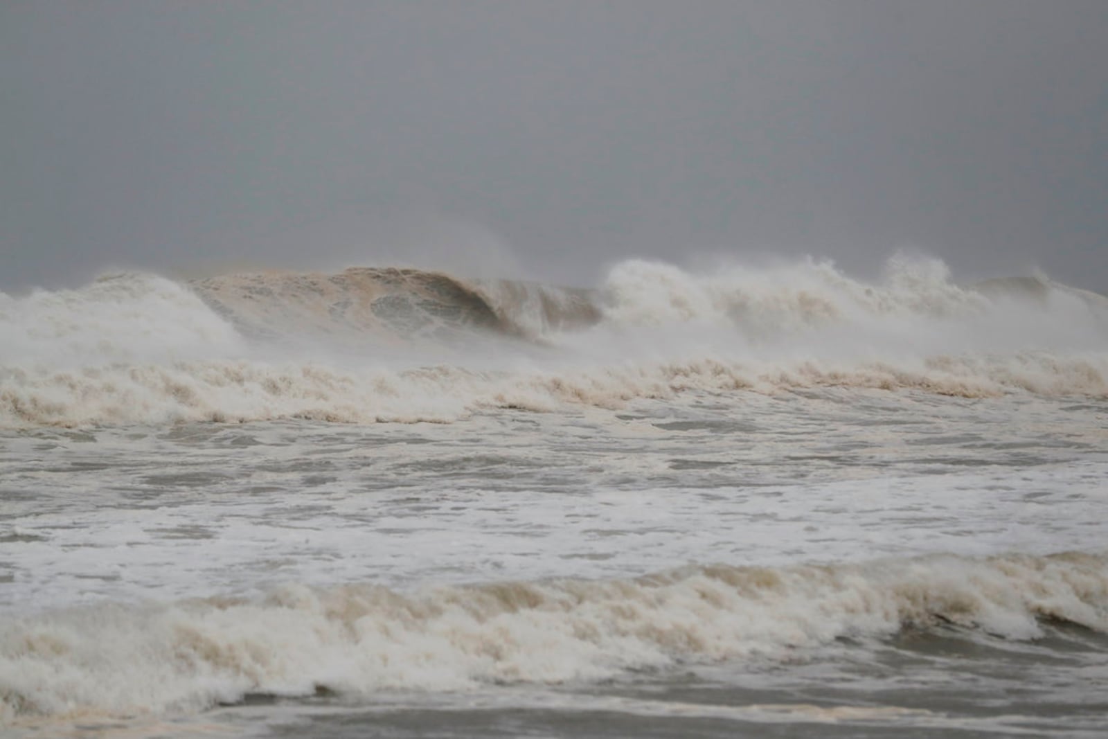 The surf kicks up from approaching Hurricane Michael in Panama City Beach, Fla., Wednesday, Oct. 10, 2018. (AP Photo/Gerald Herbert)