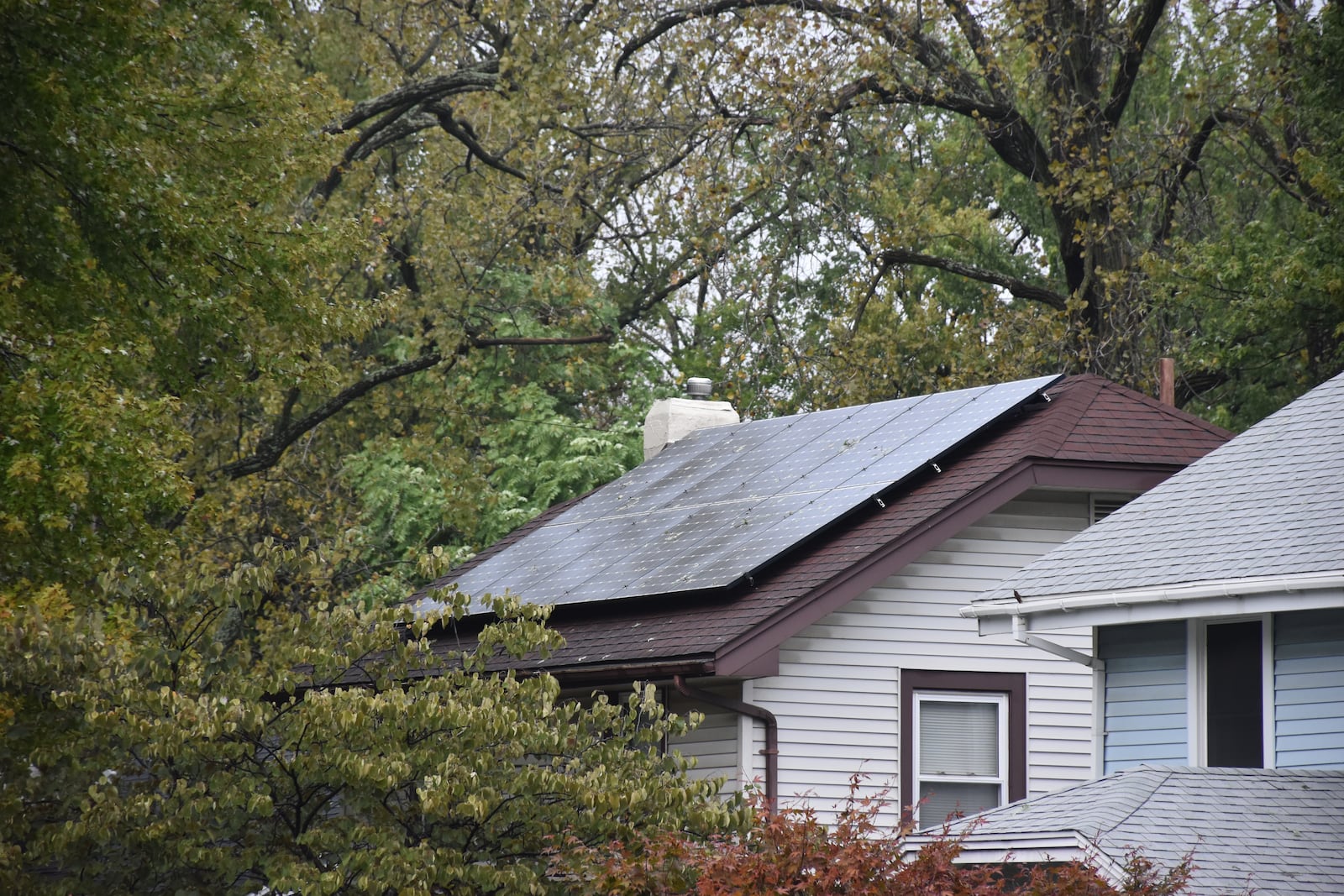 Solar panels on the roof of a home in Dayton. CORNELIUS FROLIK / STAFF