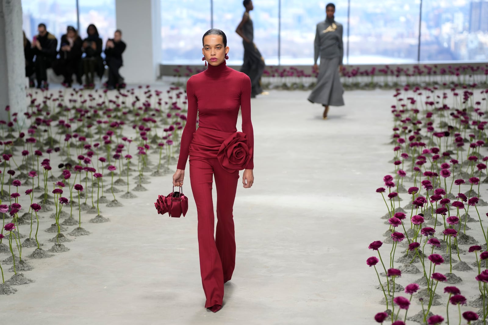 Models walk the runway during the Carolina Herrera Fall/Winter 2025 fashion show as part of New York Fashion Week on Monday, Feb. 10, 2025, in New York. (Photo by Charles Sykes/Invision/AP)