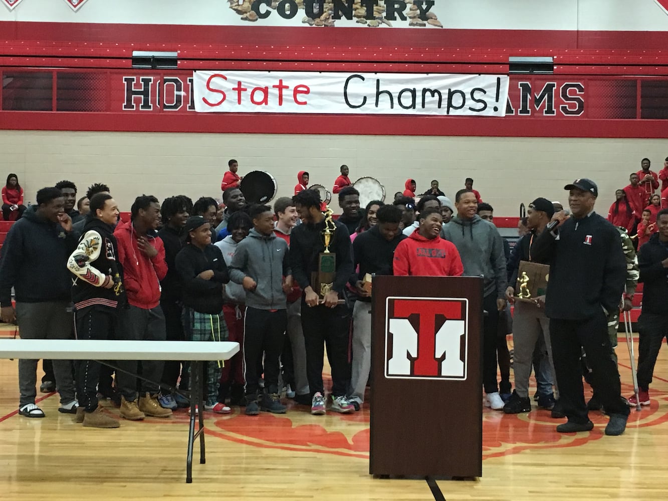 PHOTOS: Trotwood parents and fans welcome home football state champs at victory celebration