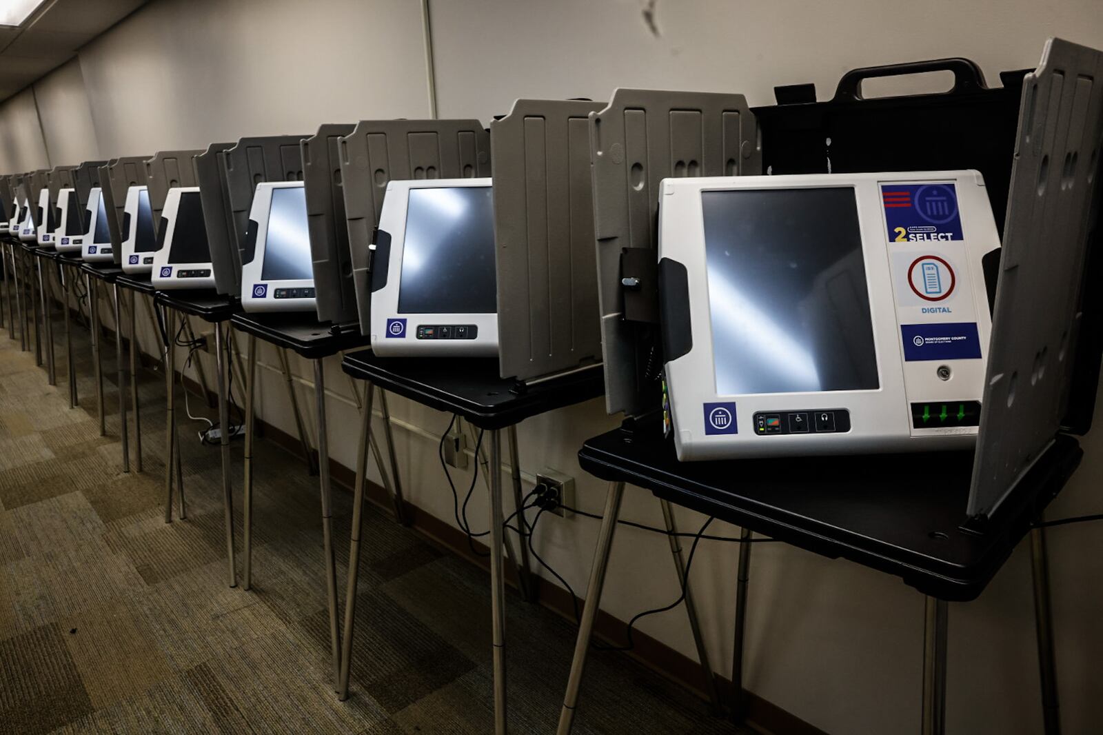 Electronic voting machines are lined-up and ready to go at the Montgomery County Board of Elections on East Third Street. JIM NOELKER/STAFF