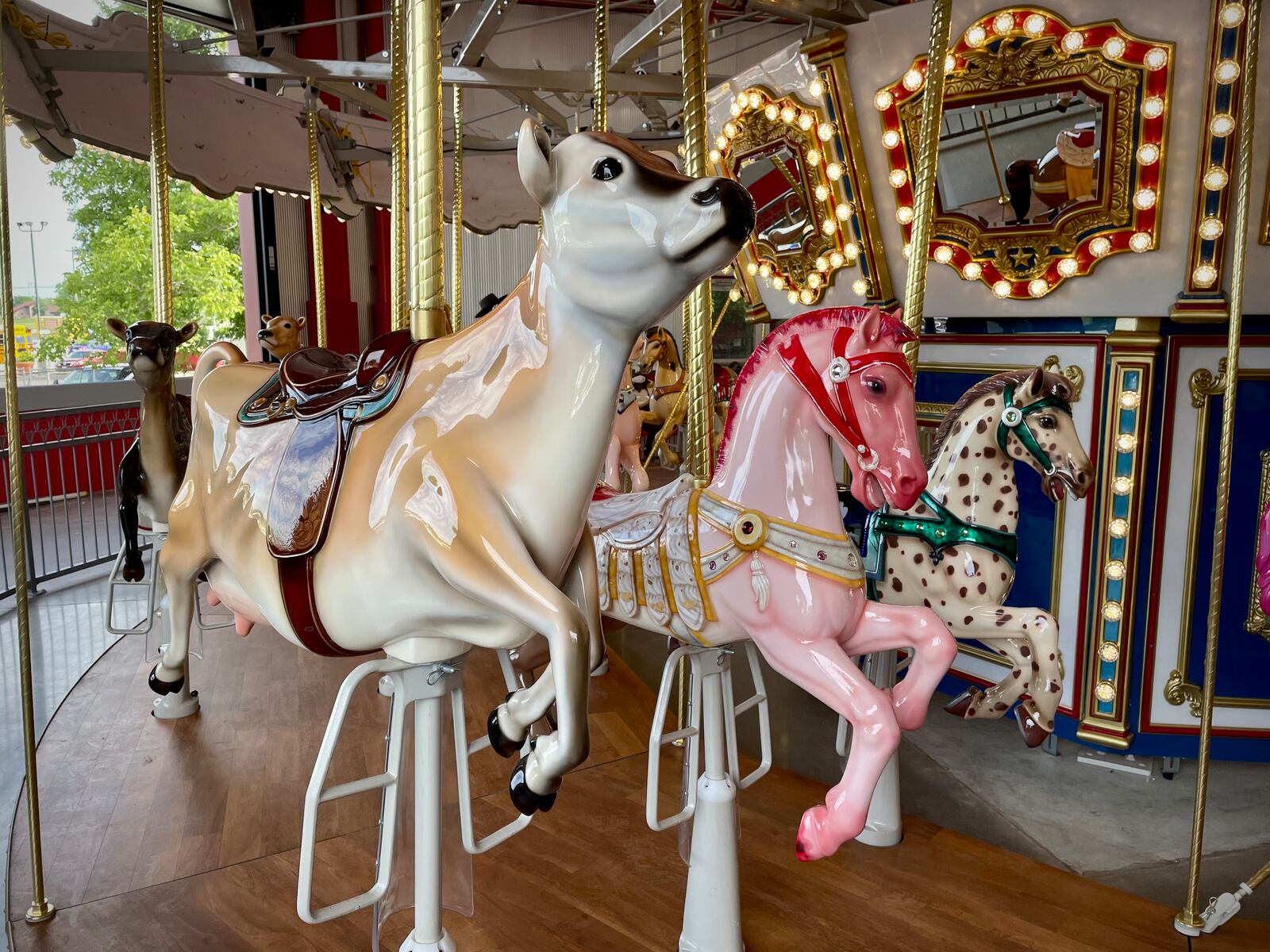 The debut of “Cowtherine’s Carousel” at Young’s Jersey Dairy is just around the corner. The 36-foot carousel featuring 21 horses, six Jersey cows, one pig, one goat and a rooster will open to the public at 7:30 p.m. on July 11. Each animal is hand painted and the horses are decorated to represent Young’s Homemade Ice Cream colors. NATALIE JONES/STAFF