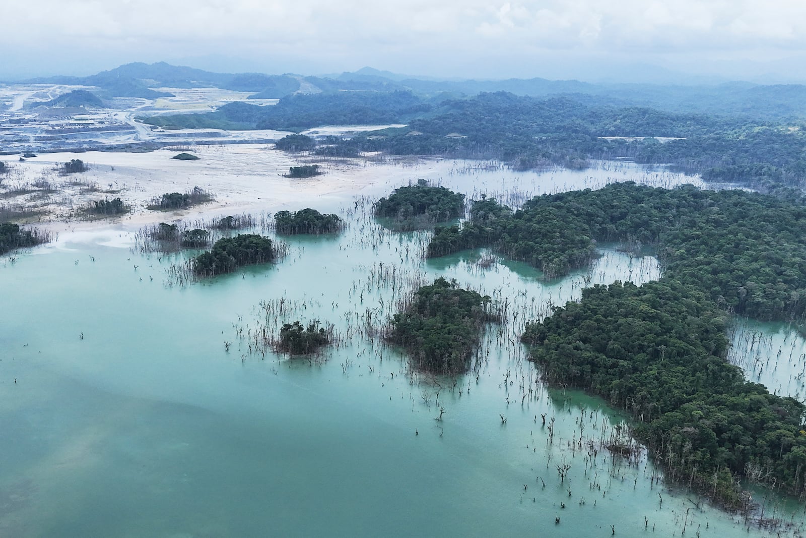 A view of the tailing management ponds in the Cobre Panama copper mine, owned by Canada's First Quantum Minerals, in Donoso, Panama, Friday, March 21, 2025, during a media tour of the mine that was closed after Panama's Supreme Court ruled that the government concession was unconstitutional. (AP Photo/Matias Delacroix)