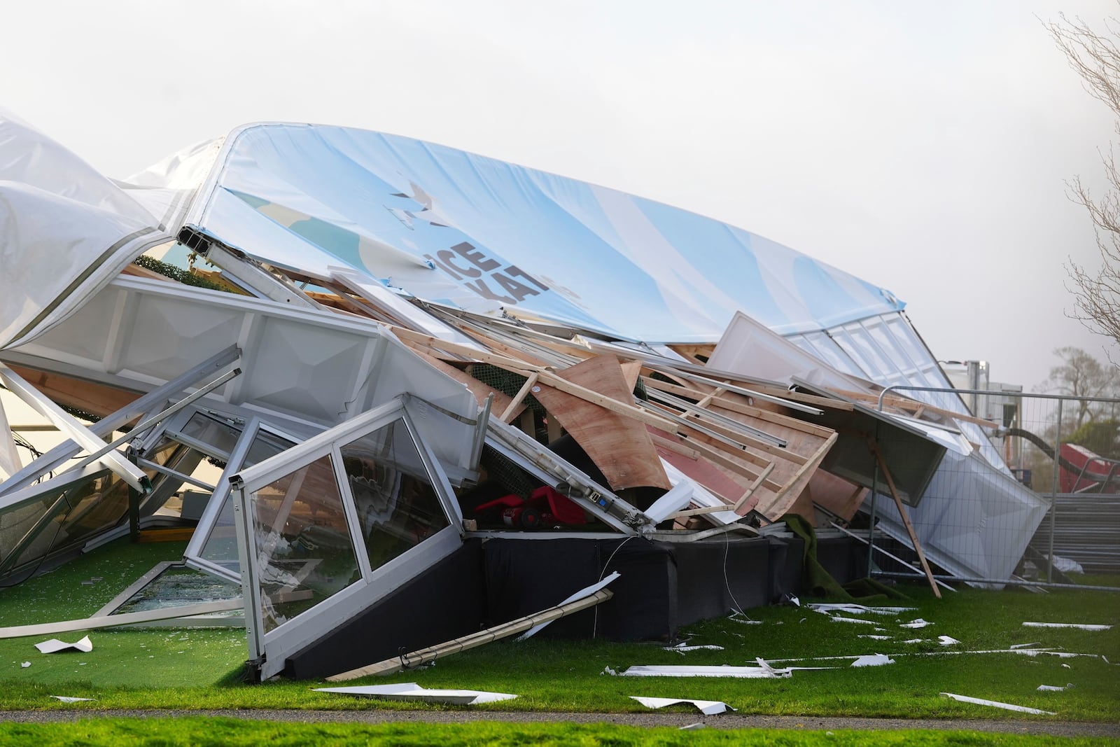 The remains of an ice skating facility destroyed after strong winds tore the structure apart are pictured in Blanchardstown, Ireland, Friday, Jan.24, 2025, as Storm Eowyn hit the island. (Brian Lawless/PA via AP)