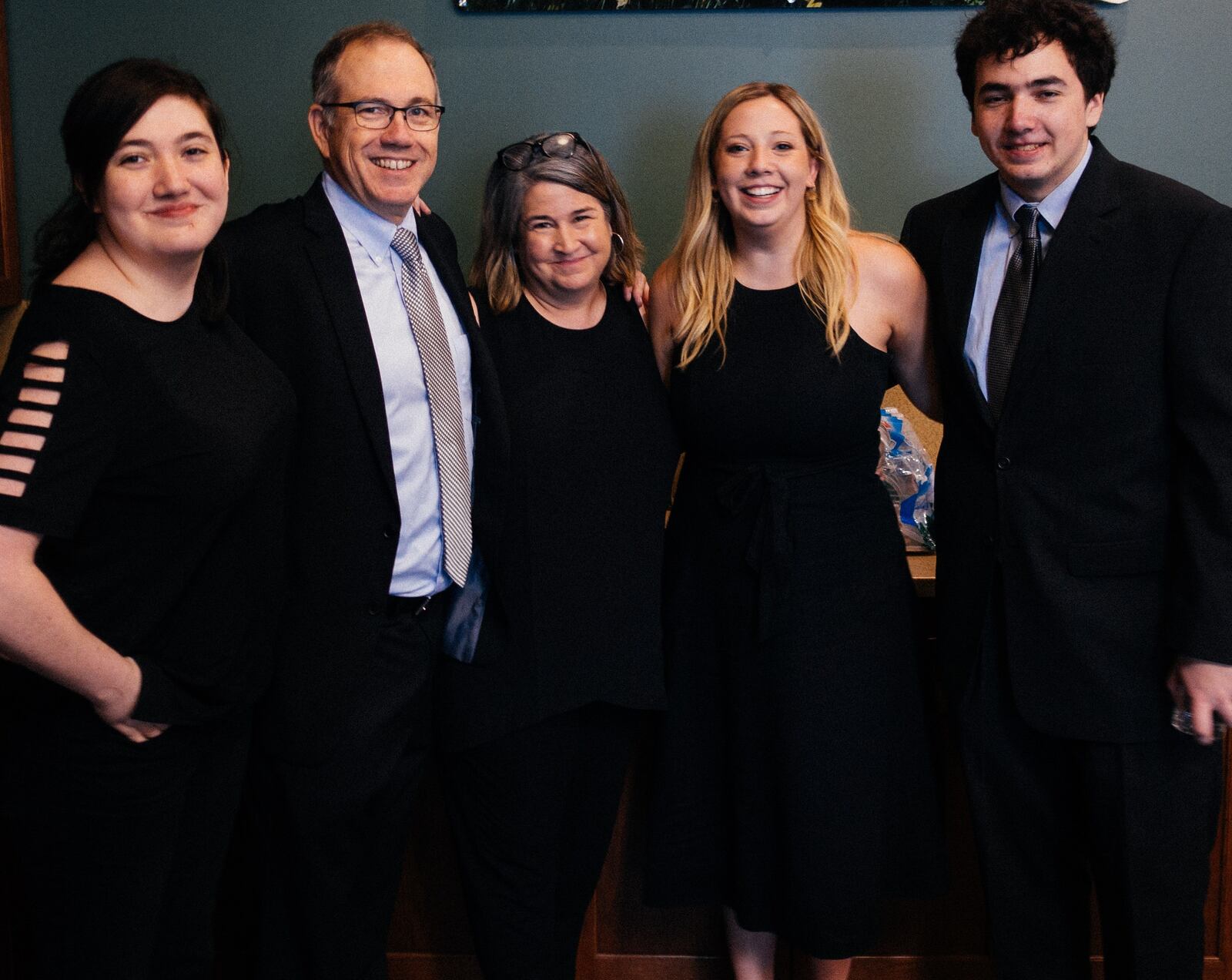 Oregon district resident Amy and Kevin Deal (third and second from left)  became ill after a trip to New York. They suspect they had the coronavirus. They are pictured with their children Rebecca, Grace and Eddie.